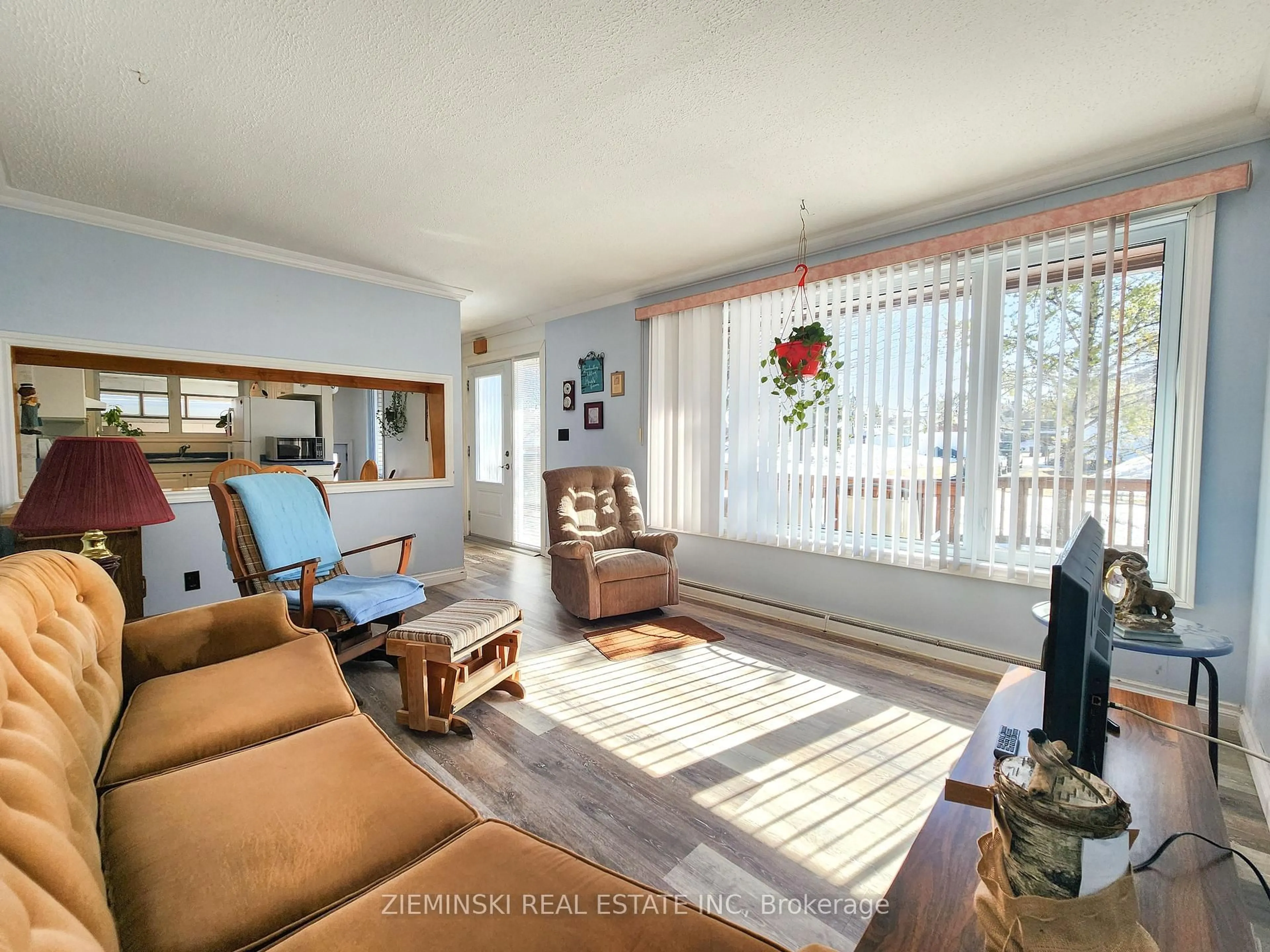 Living room with furniture, wood/laminate floor for 120 Picadilly Circ, Iroquois Falls Ontario P0K 1E0