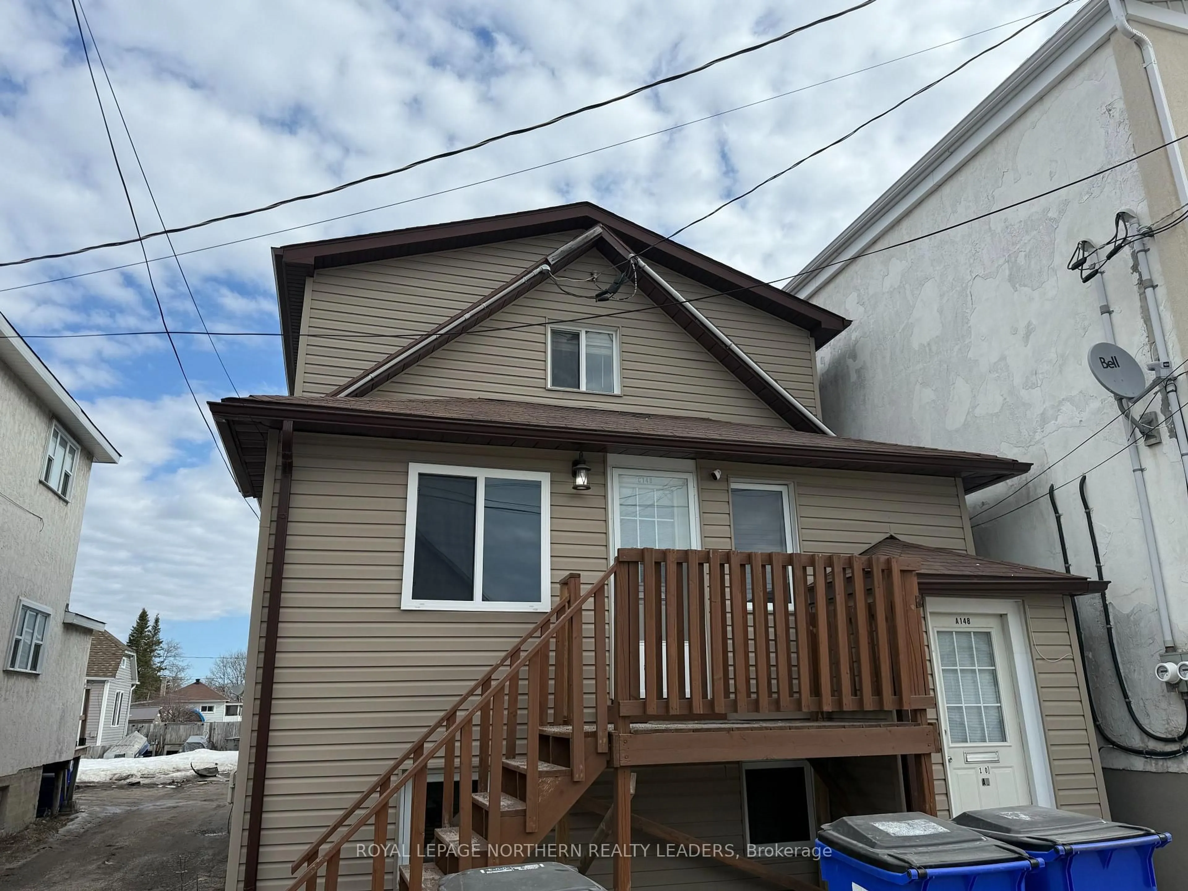 Home with vinyl exterior material, street for 148 Sixth Ave, Timmins Ontario P4N 5M3