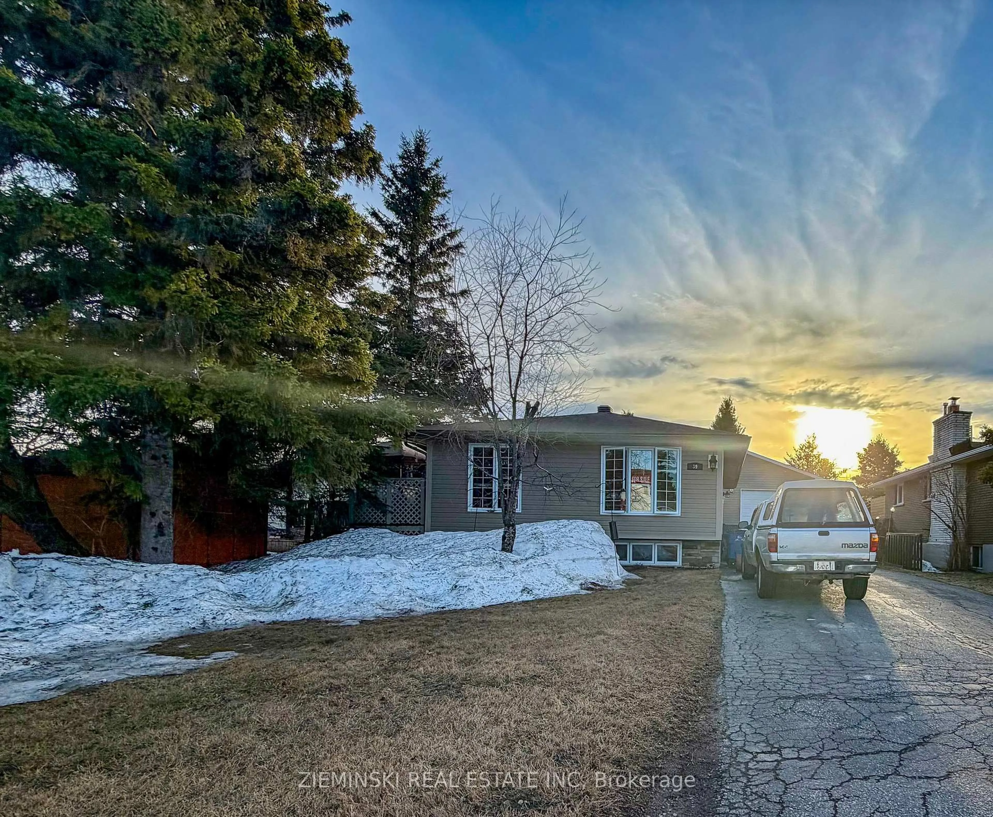 A pic from outside/outdoor area/front of a property/back of a property/a pic from drone, street for 39 Sybil Ave, Cochrane Ontario P0L 1C0