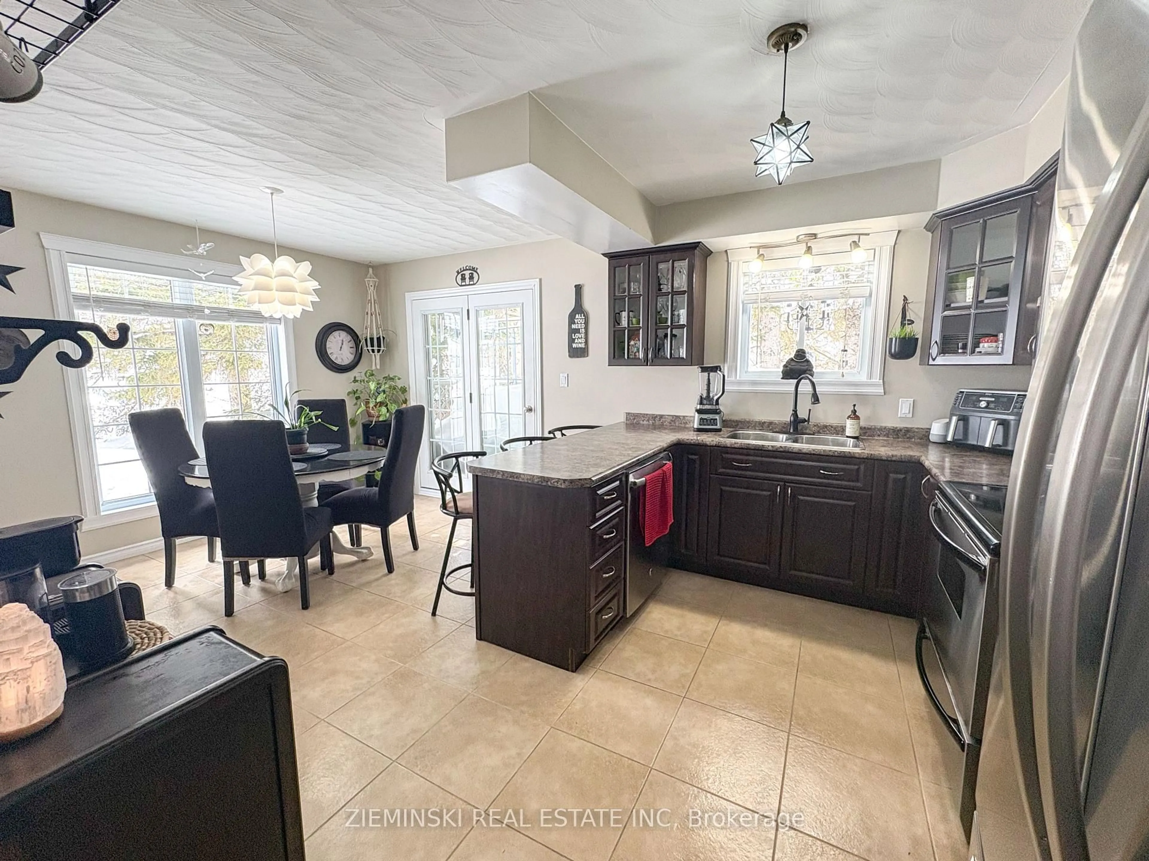 Open concept kitchen, ceramic/tile floor for 39 Sybil Ave, Cochrane Ontario P0L 1C0