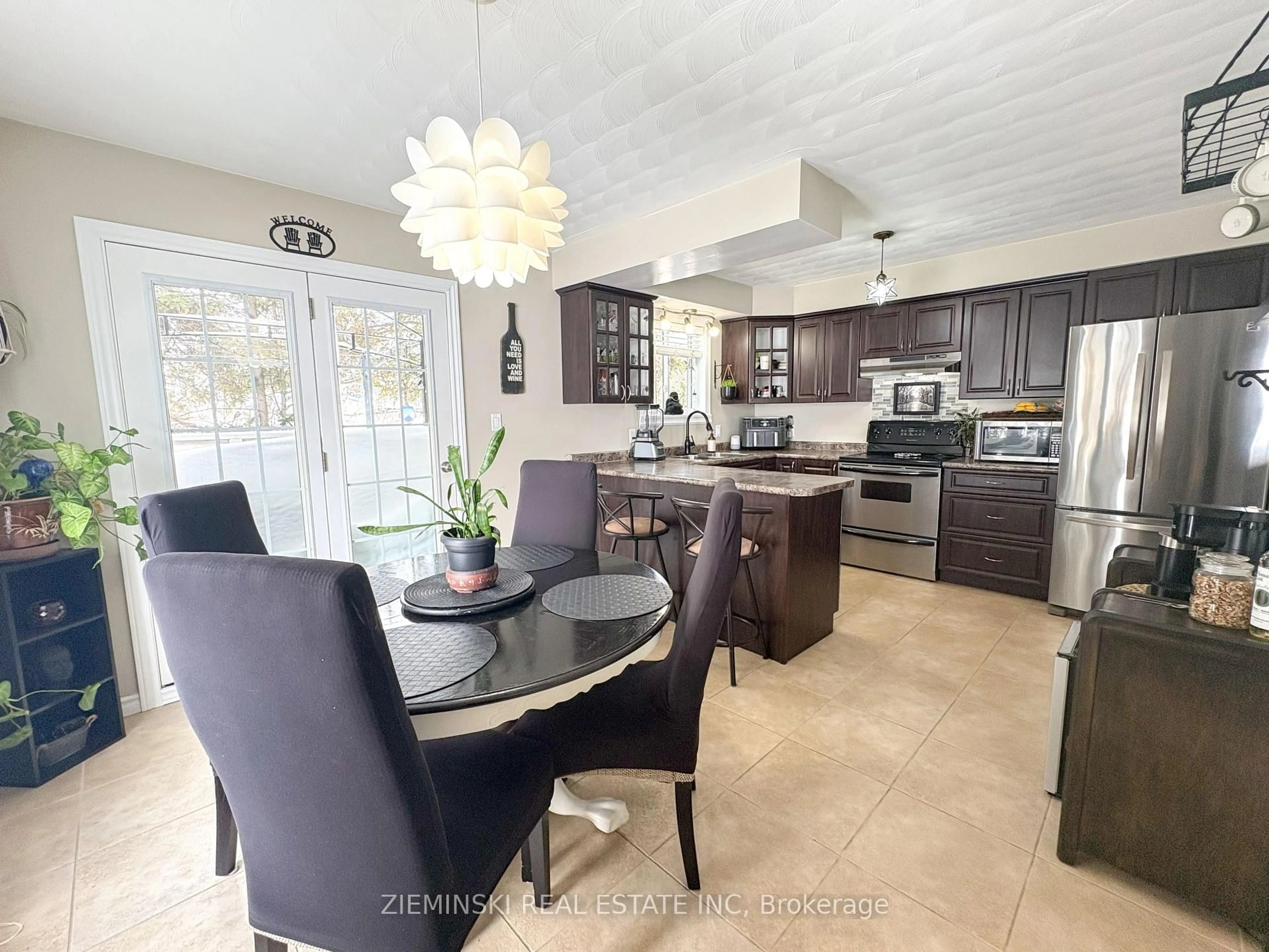 Open concept kitchen, ceramic/tile floor for 39 Sybil Ave, Cochrane Ontario P0L 1C0