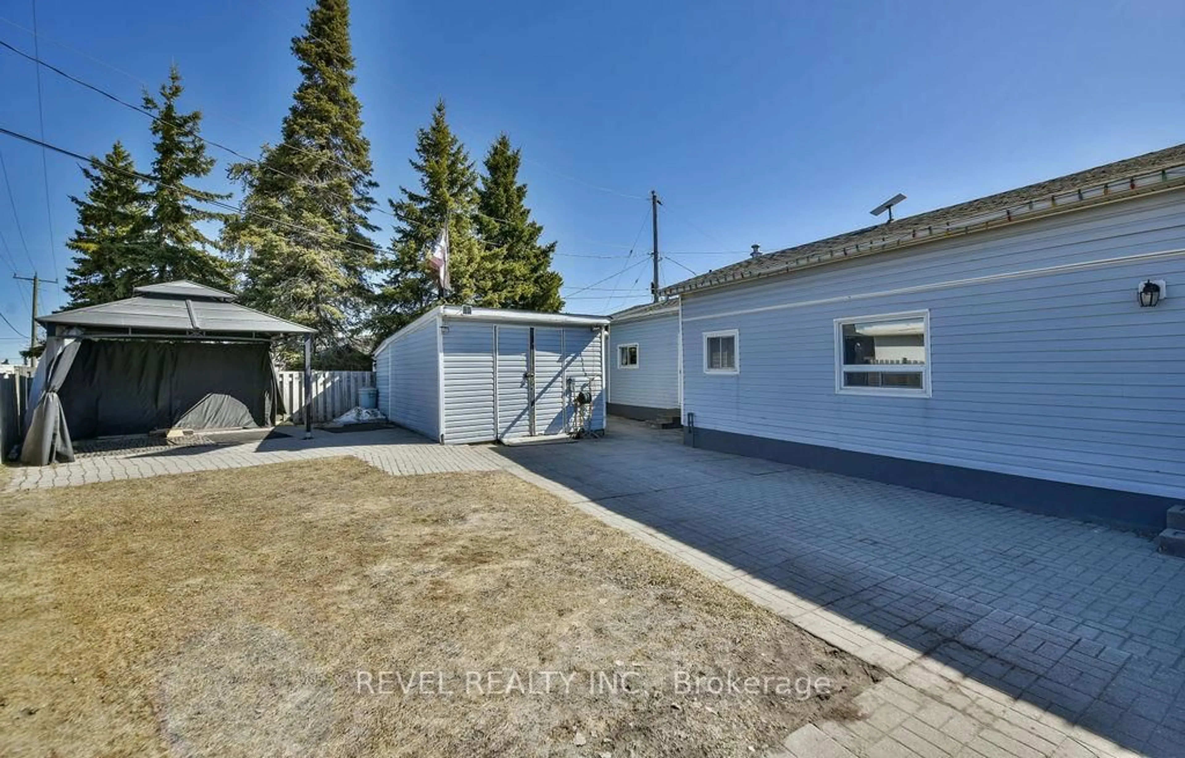 A pic from outside/outdoor area/front of a property/back of a property/a pic from drone, street for 2 Rovie Ave, Timmins Ontario P4N 0C8