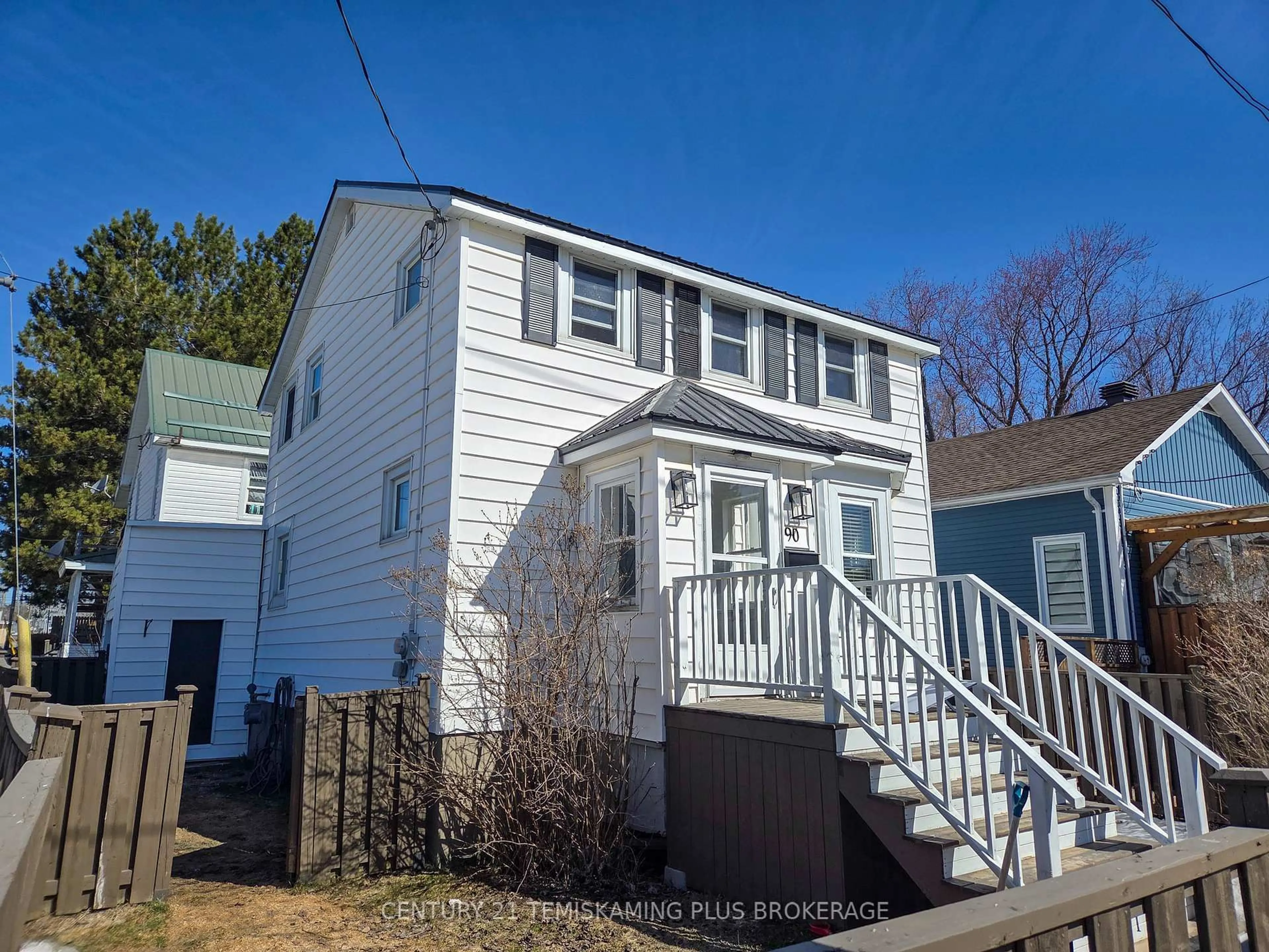 Home with vinyl exterior material, street for 90 Tower St, Kirkland Lake Ontario P2N 1P6