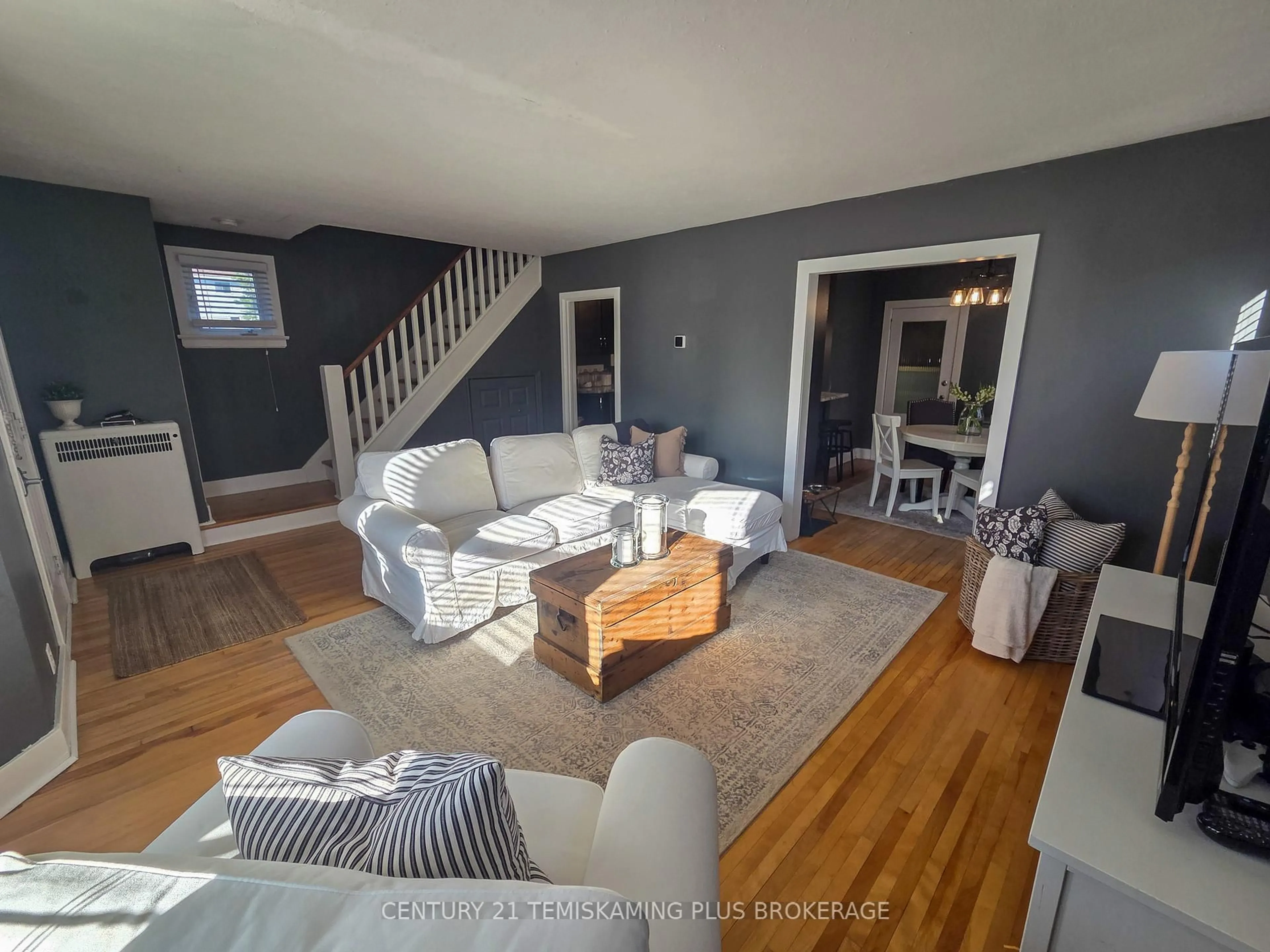 Living room with furniture, wood/laminate floor for 90 Tower St, Kirkland Lake Ontario P2N 1P6
