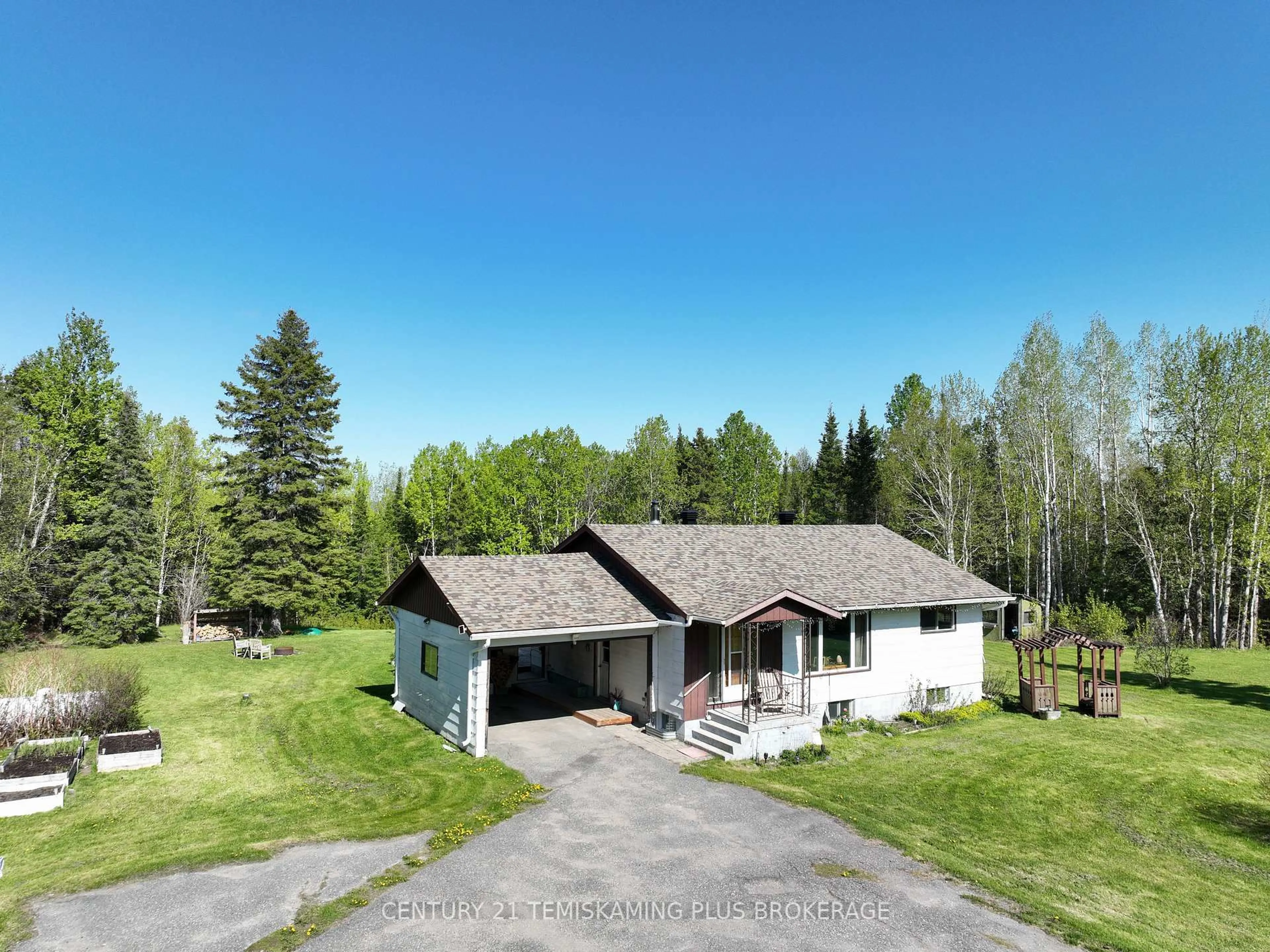 A pic from outside/outdoor area/front of a property/back of a property/a pic from drone, unknown for 974641 567 Highway, Timiskaming Ontario P0J 1R0