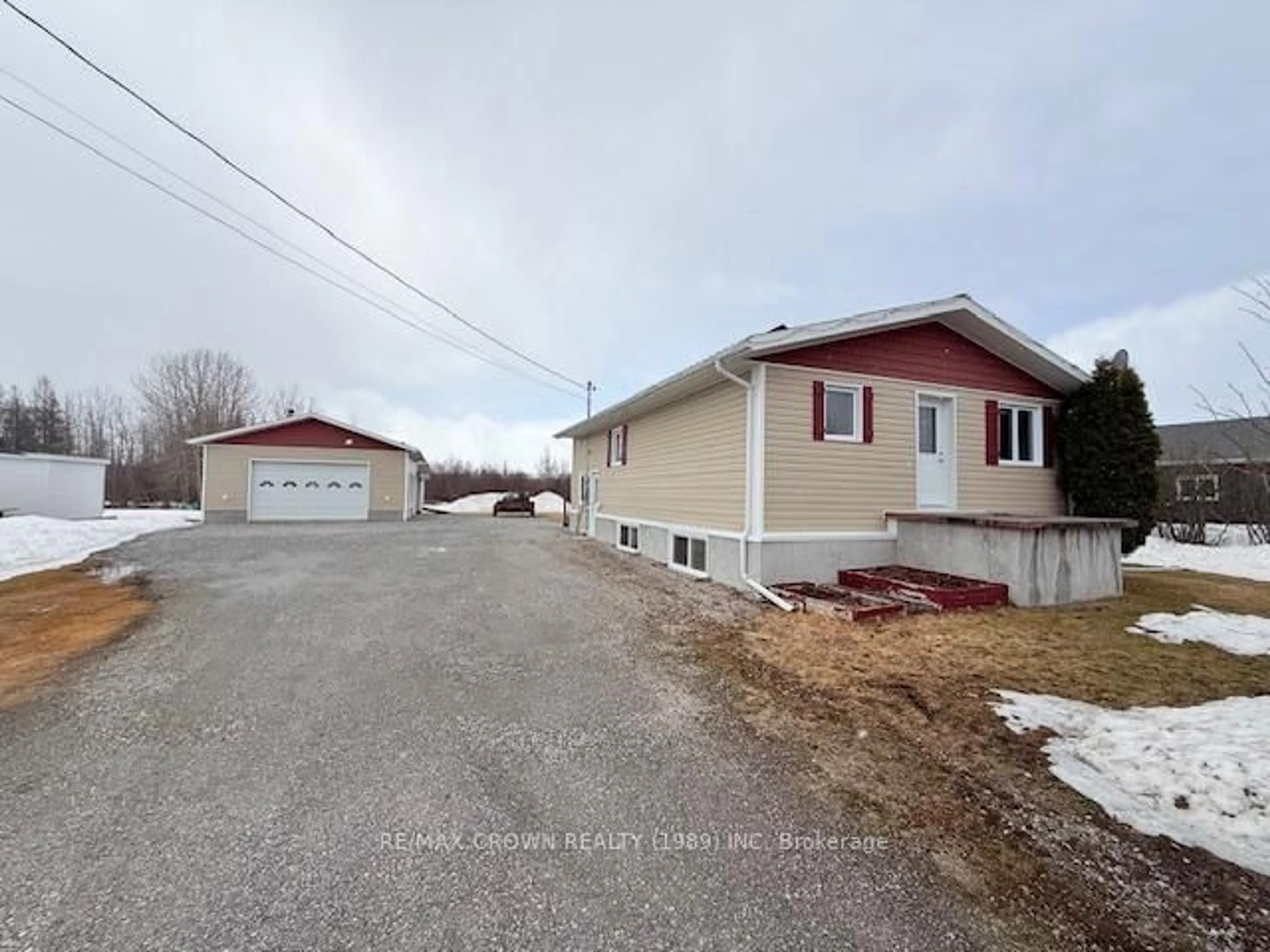 A pic from outside/outdoor area/front of a property/back of a property/a pic from drone, street for 233 Brunetville Rd, Kapuskasing Ontario P5N 2H2