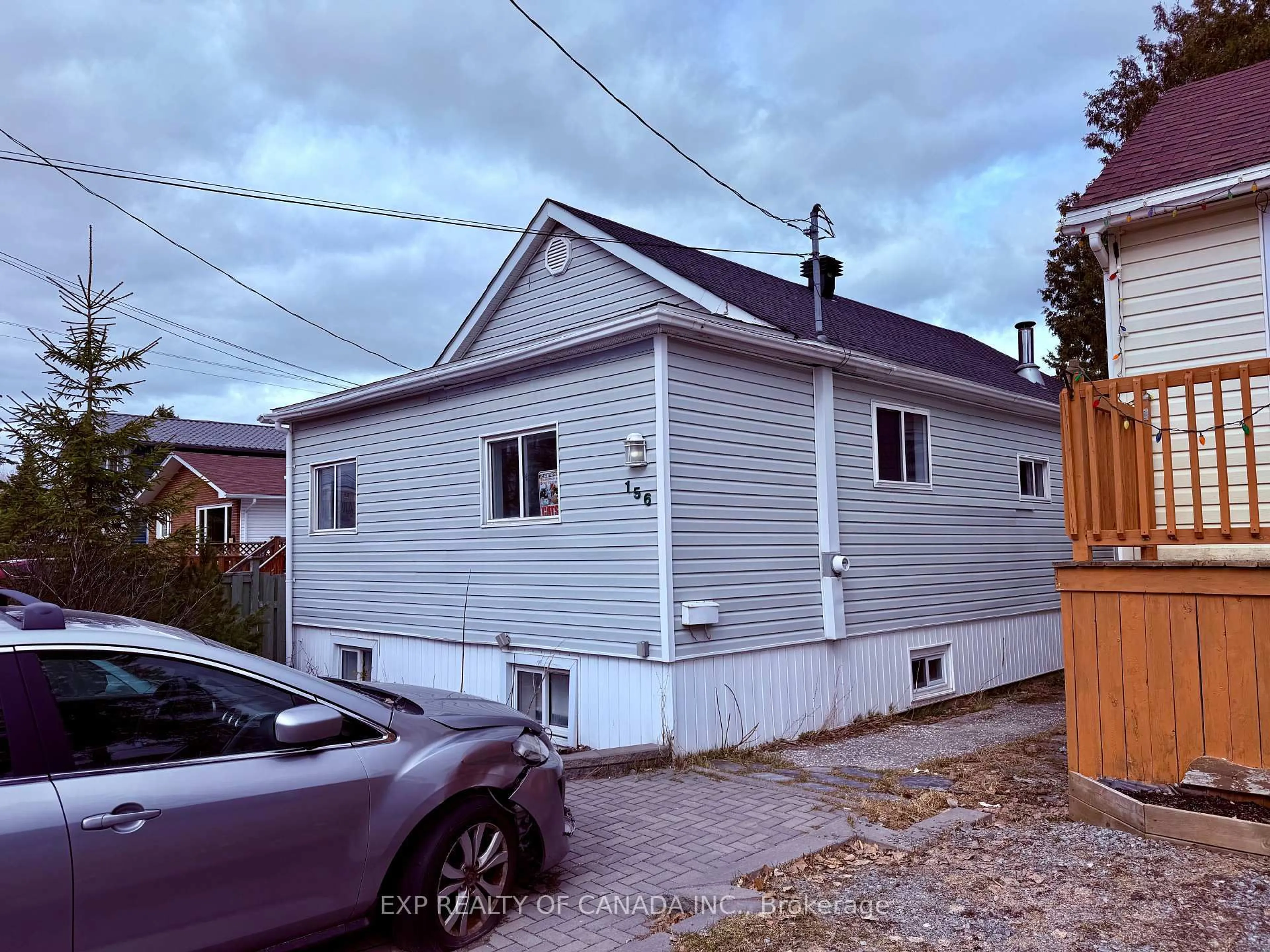 Home with vinyl exterior material, street for 156 Cameron St, Timmins Ontario P4N 5B7
