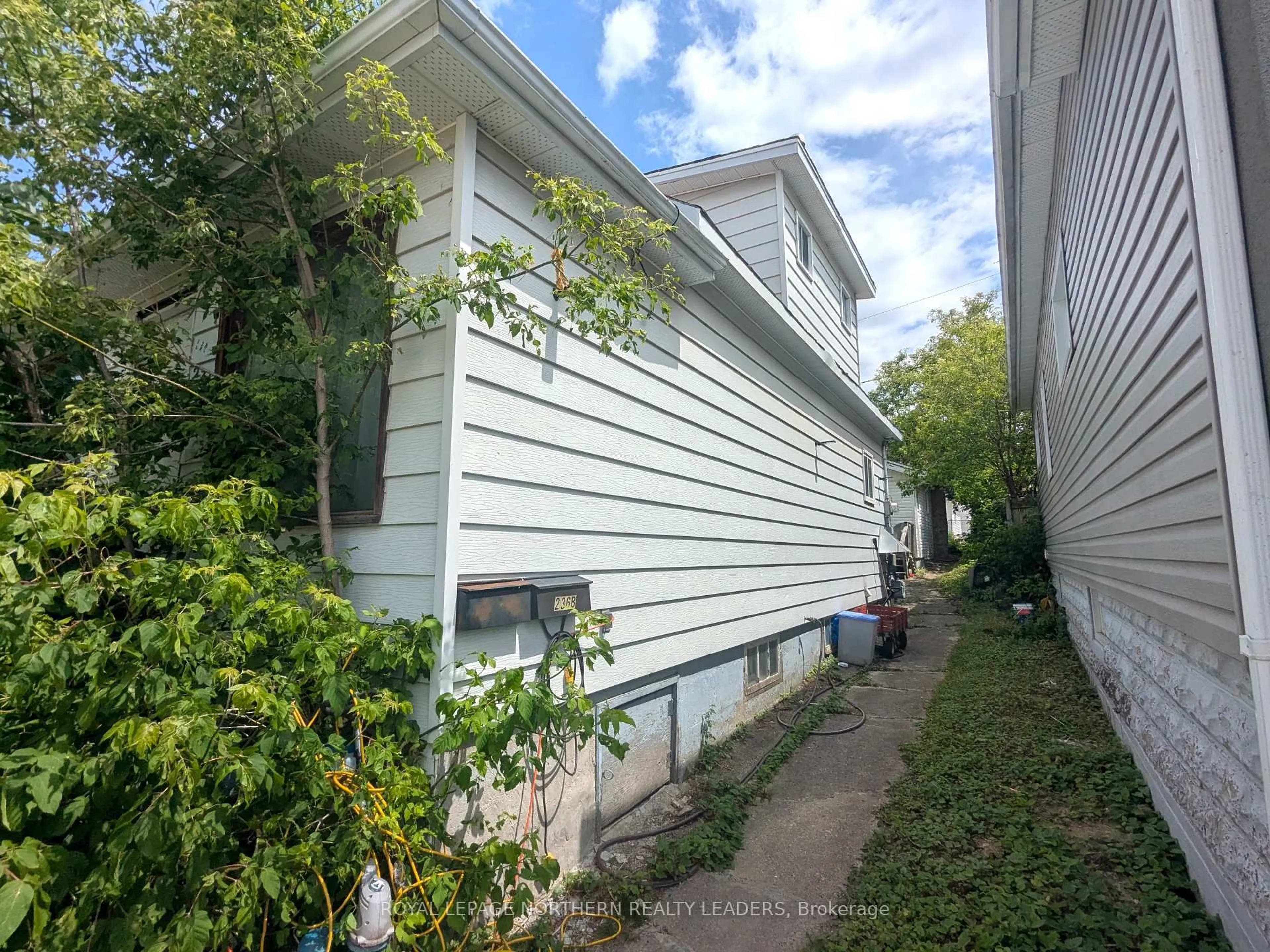 Home with vinyl exterior material, street for 236 Tamarack St, Timmins Ontario P4N 6R1