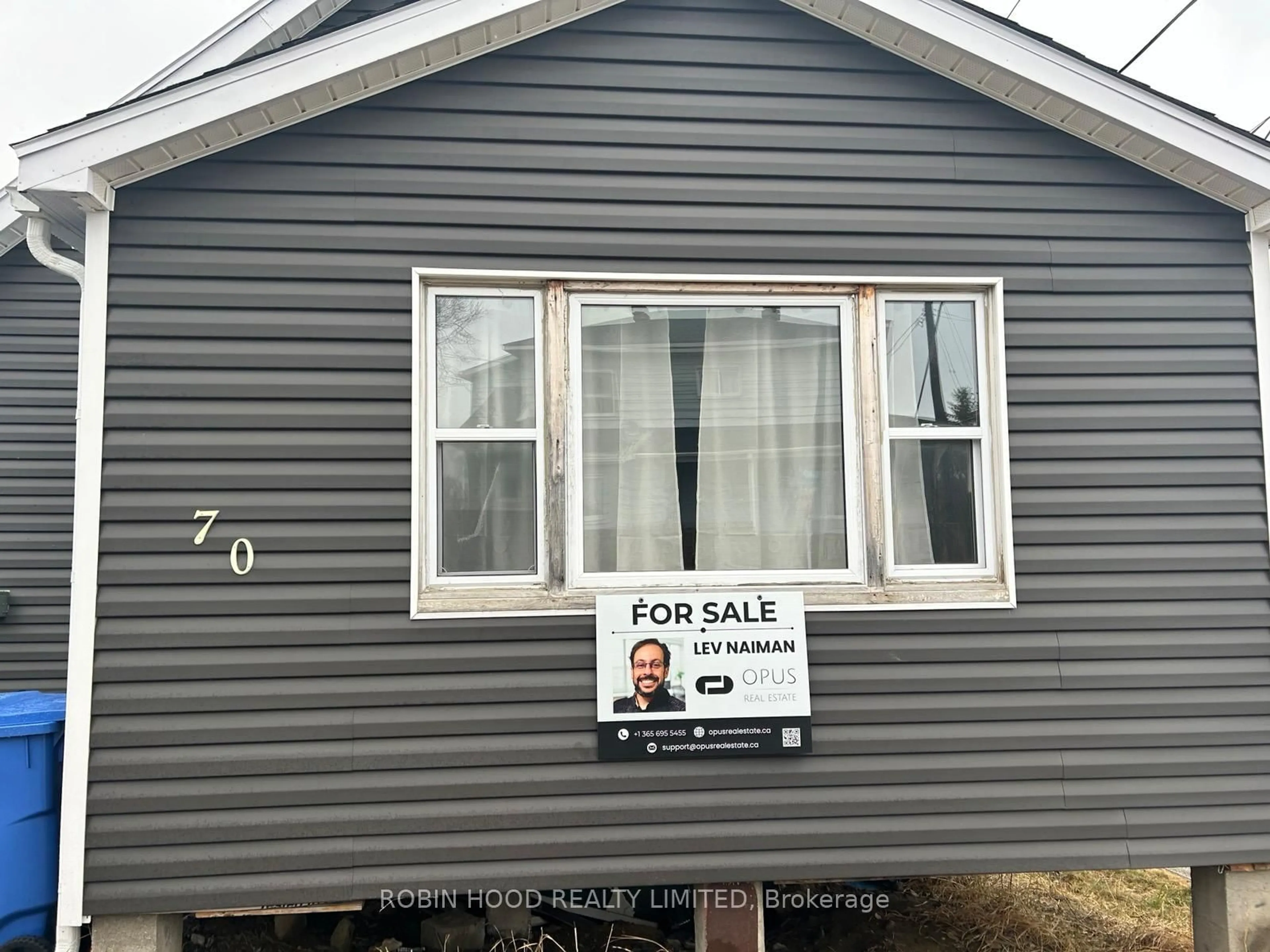 Home with vinyl exterior material, street for 70 Prospect Ave, Kirkland Lake Ontario P2N 2W5