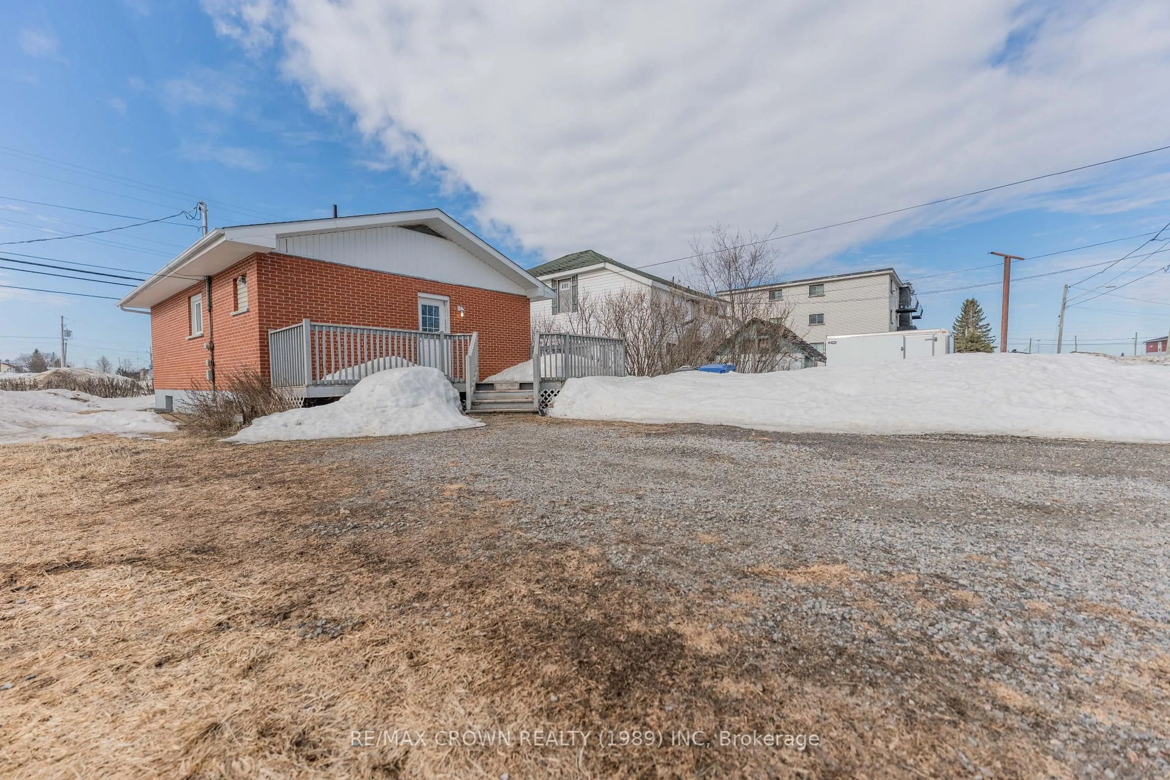 A pic from outside/outdoor area/front of a property/back of a property/a pic from drone, street for 116 Brunetville Rd, Kapuskasing Ontario P5N 2G4