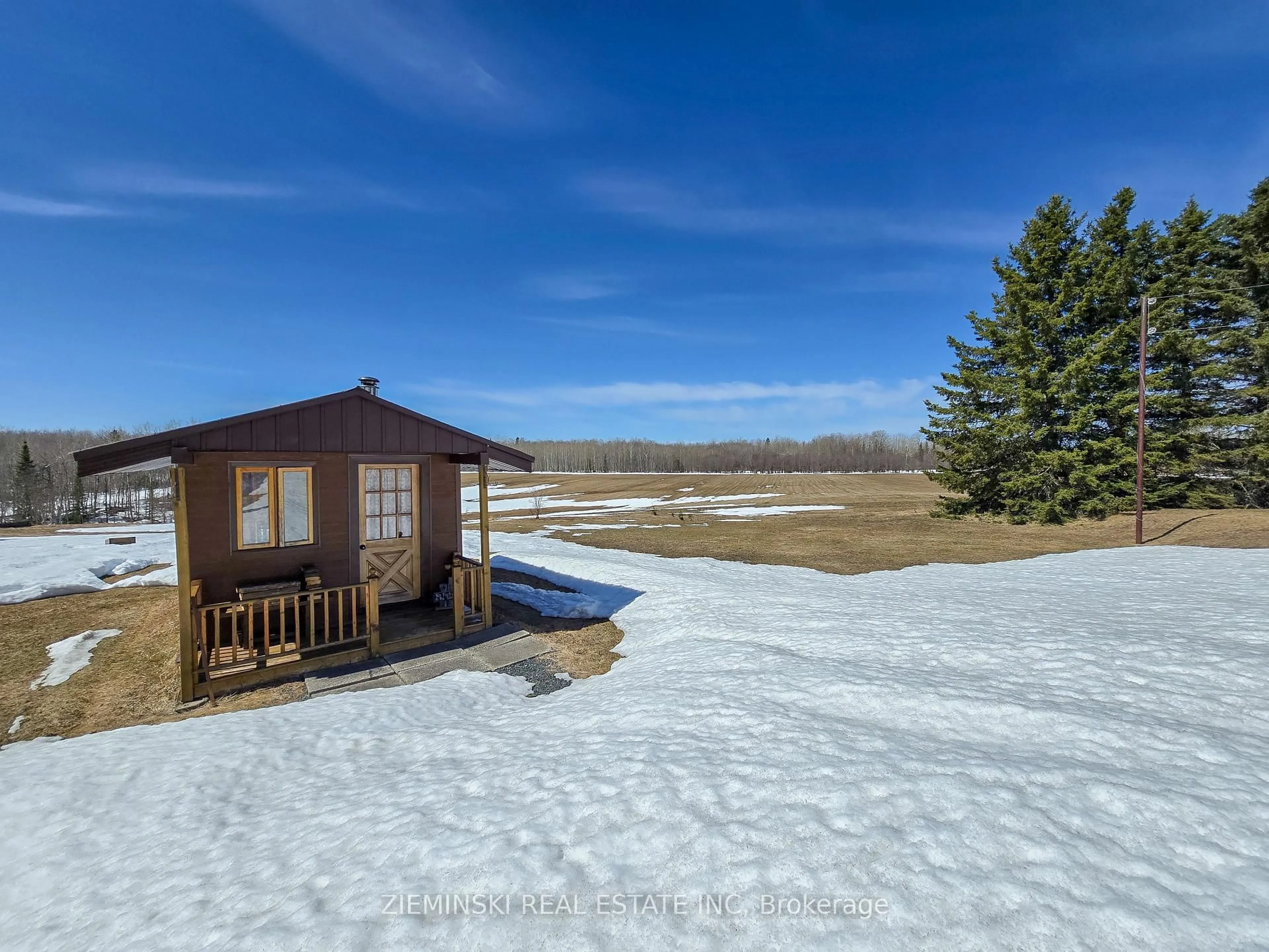 A pic from outside/outdoor area/front of a property/back of a property/a pic from drone, water/lake/river/ocean view for 1222 Majalahti Rd, Iroquois Falls Ontario P0K 1G0