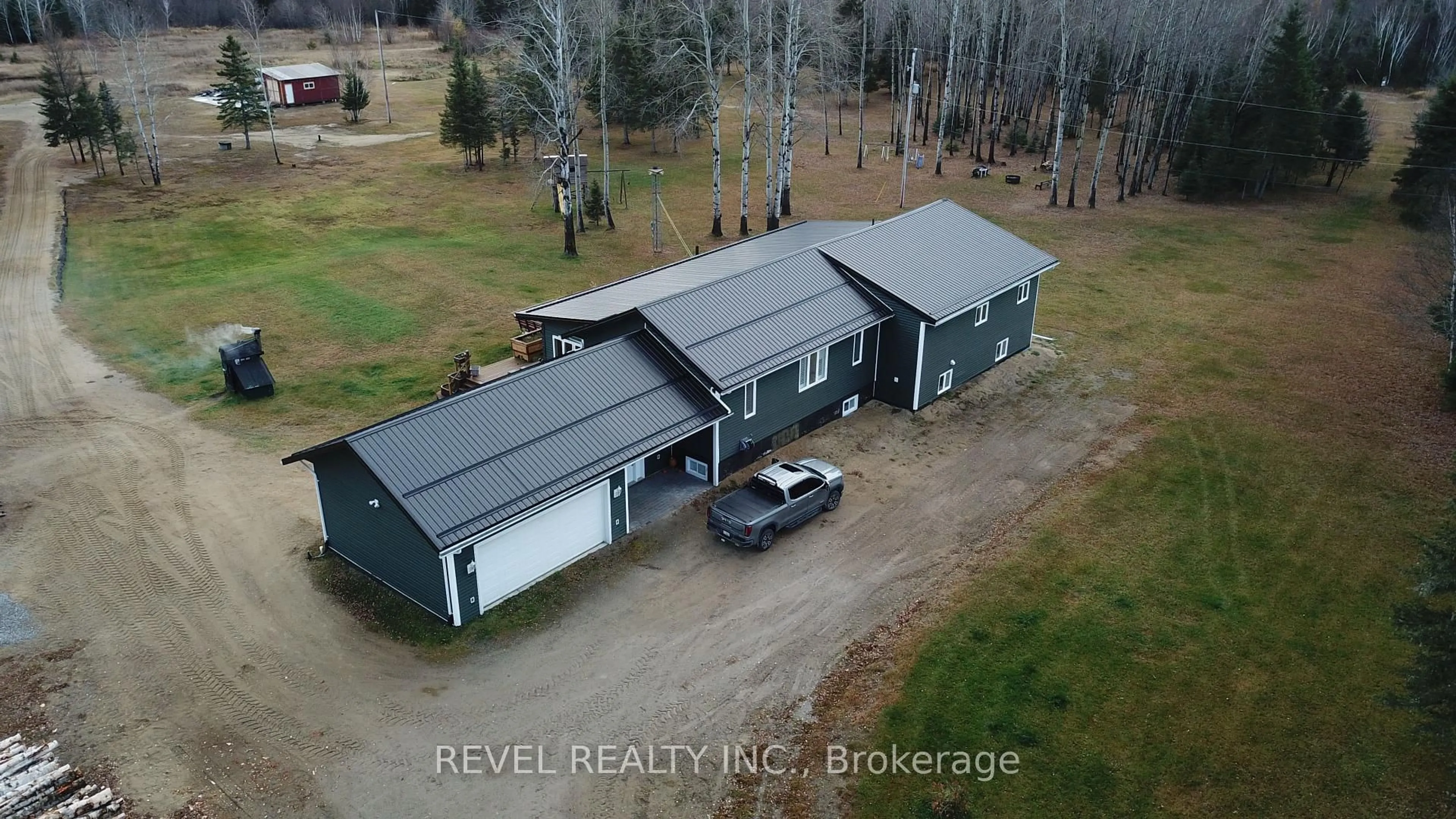 A pic from outside/outdoor area/front of a property/back of a property/a pic from drone, building for 2449 Kraft Creek Rd, Timmins Ontario P4N 7C3