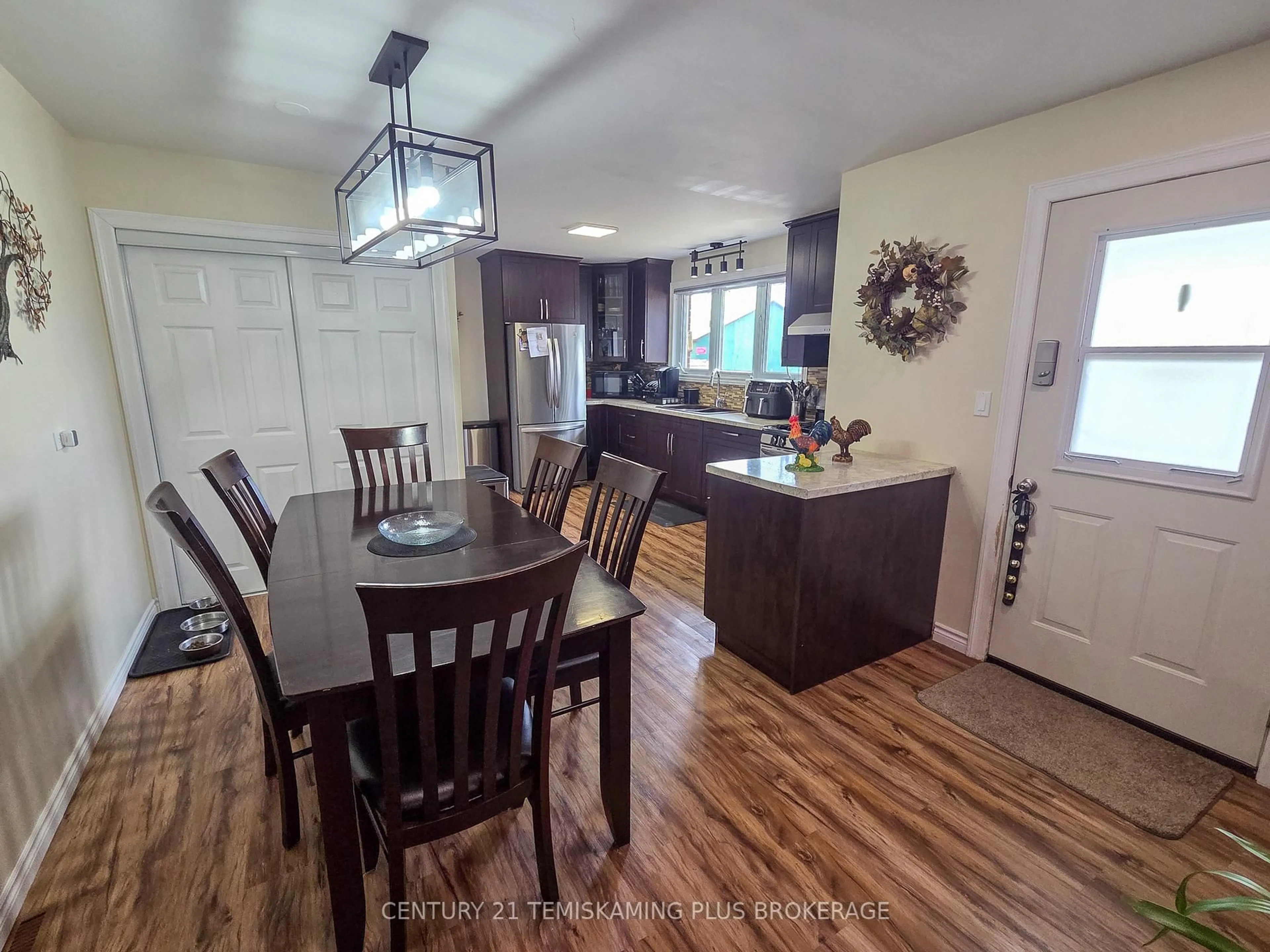 Open concept kitchen, wood/laminate floor for 8 Browns Rd, Englehart Ontario P0J 1H0