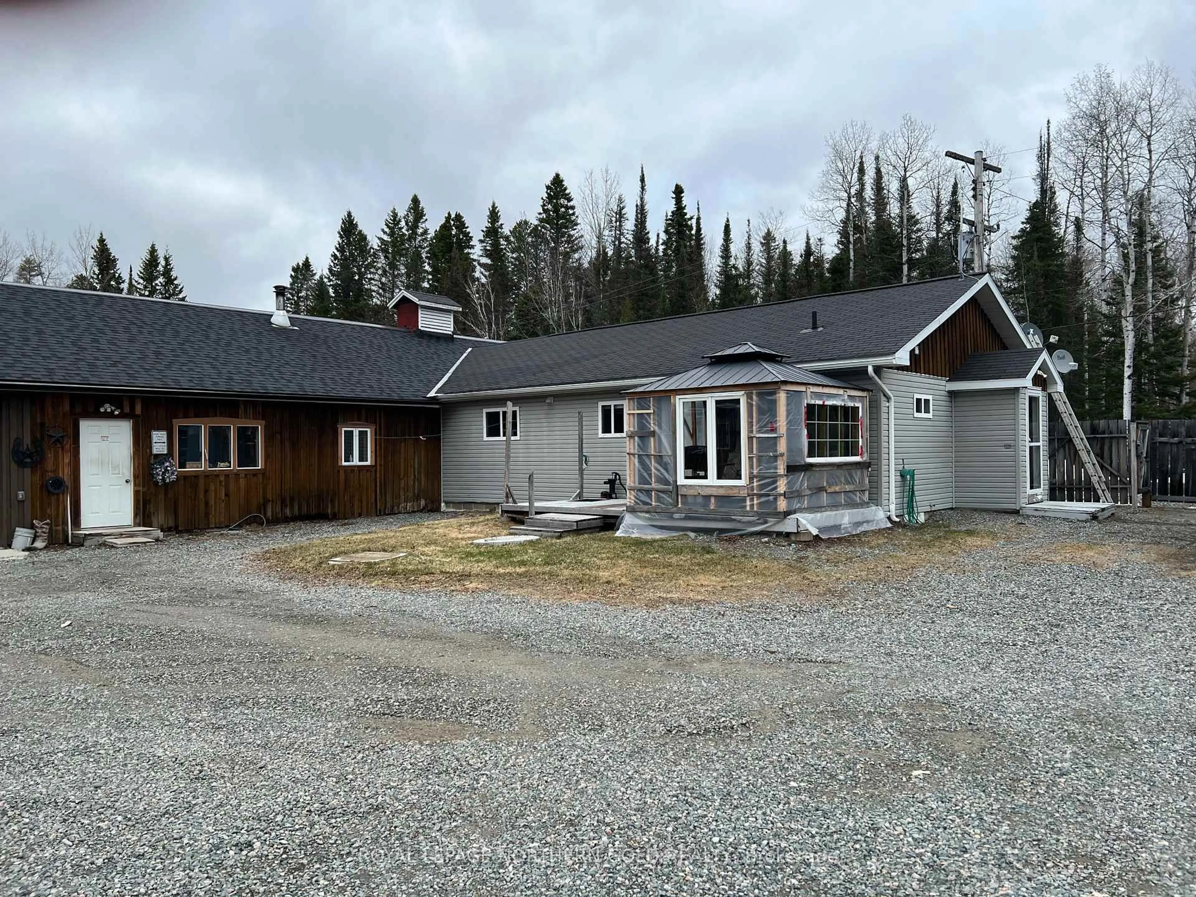 A pic from outside/outdoor area/front of a property/back of a property/a pic from drone, street for 148 McPherson St, Kirkland Lake Ontario P0K 1B0