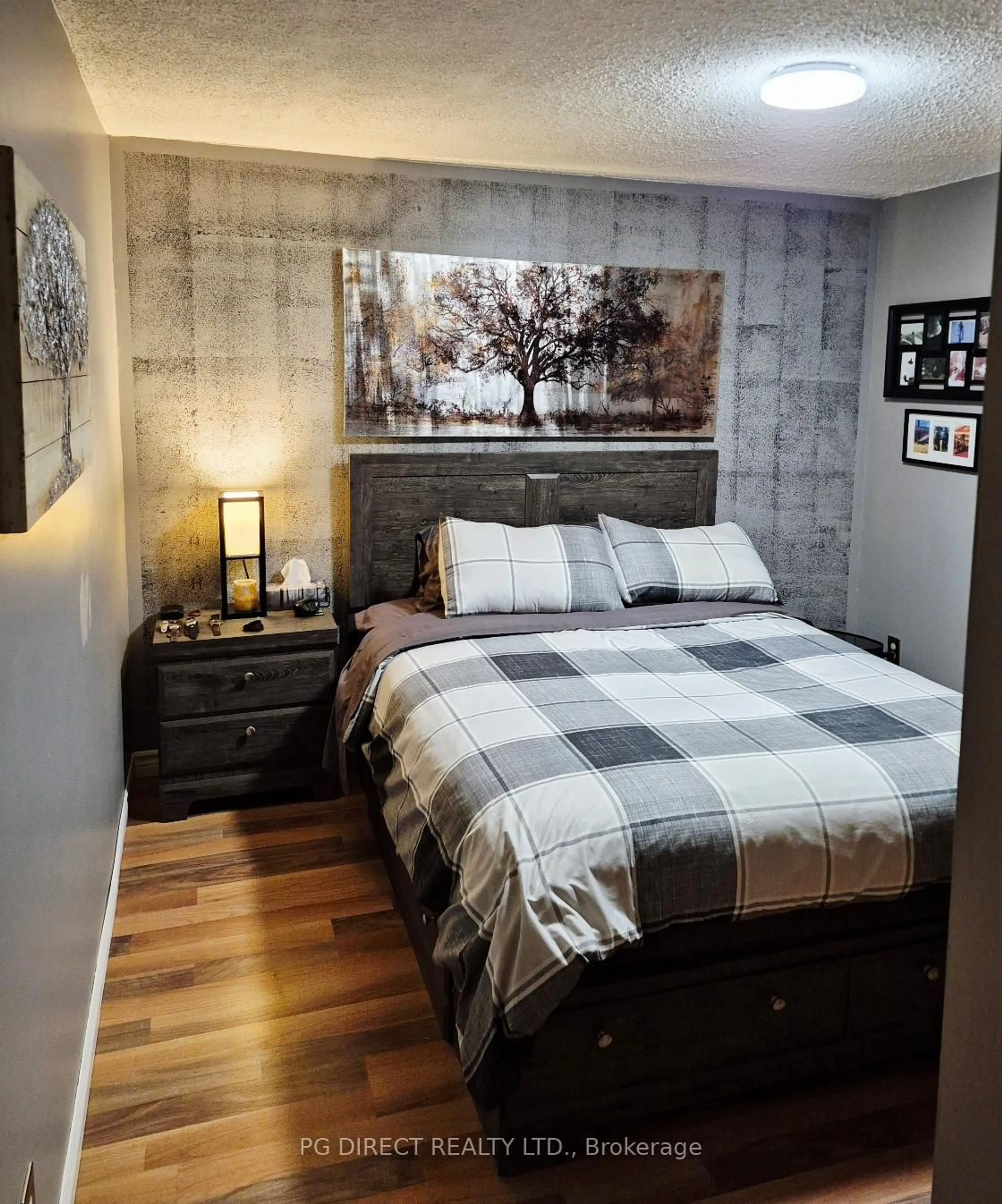Bedroom with bed, wood/laminate floor for 35 Birchill Rd, Cochrane Ontario P0L 1C0