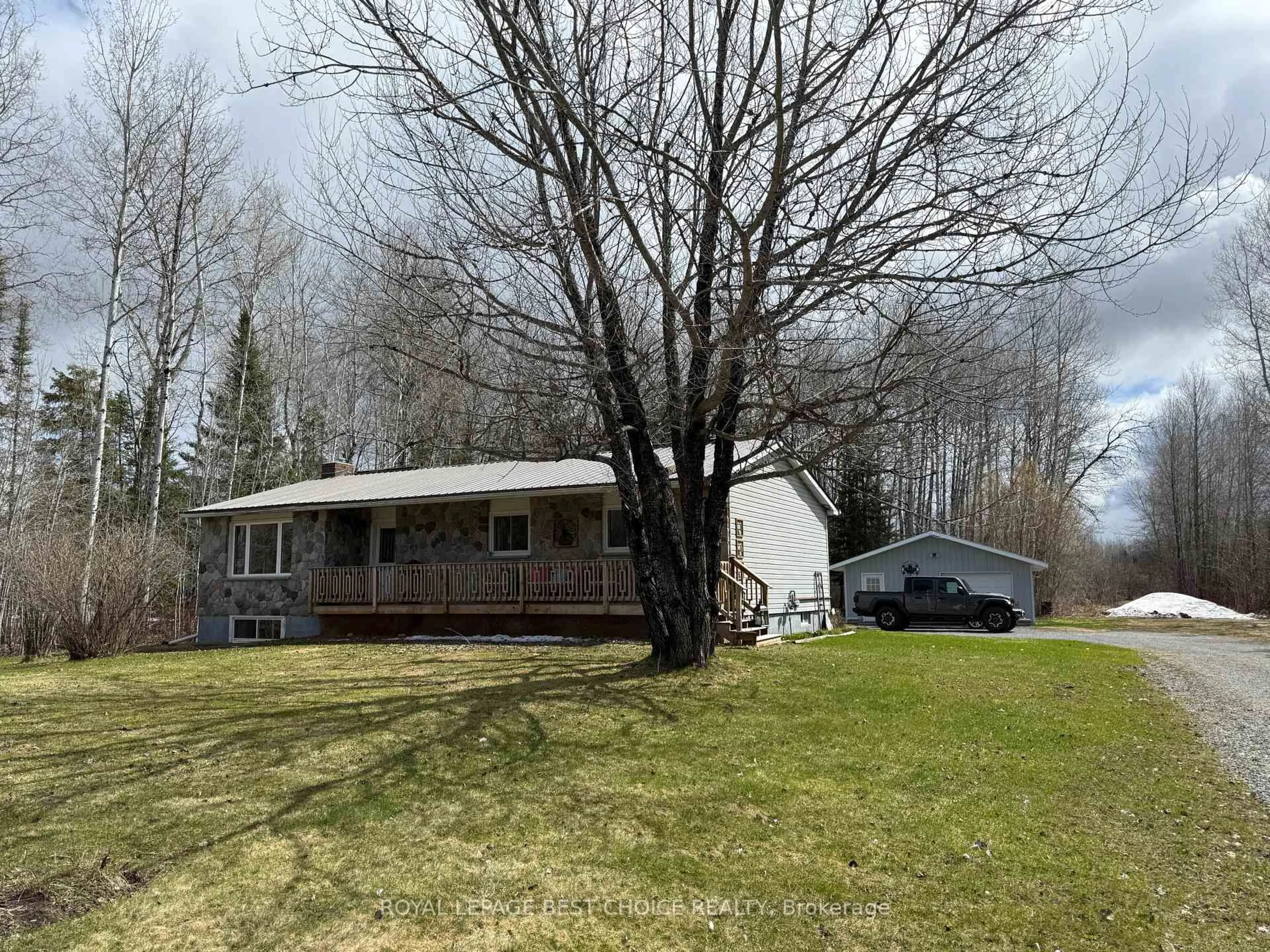 A pic from outside/outdoor area/front of a property/back of a property/a pic from drone, unknown for 69 First St, Englehart Ontario P0J 1H0