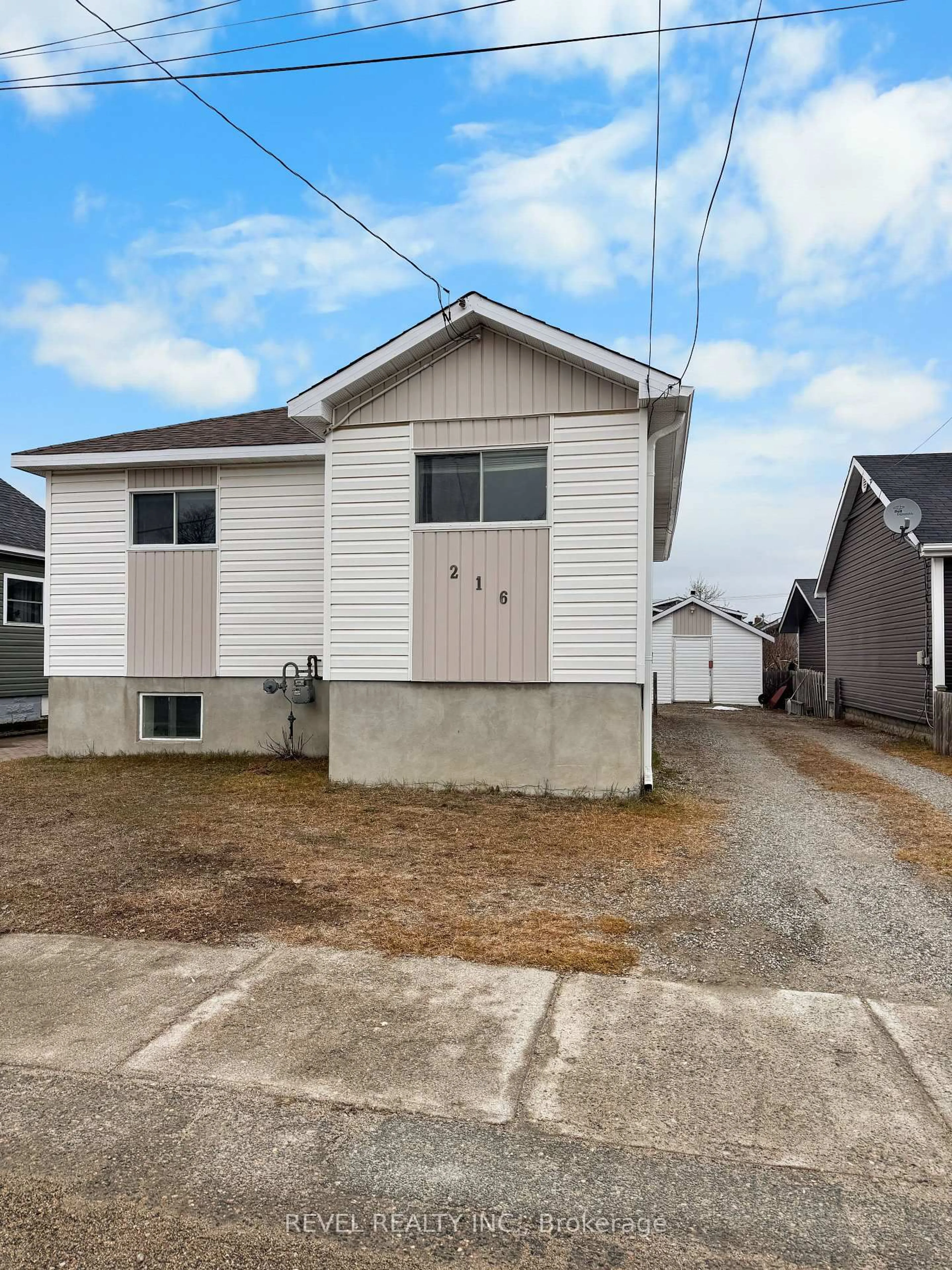 Home with vinyl exterior material, street for 216 Bannerman Ave, Timmins Ontario P4N 2Y9