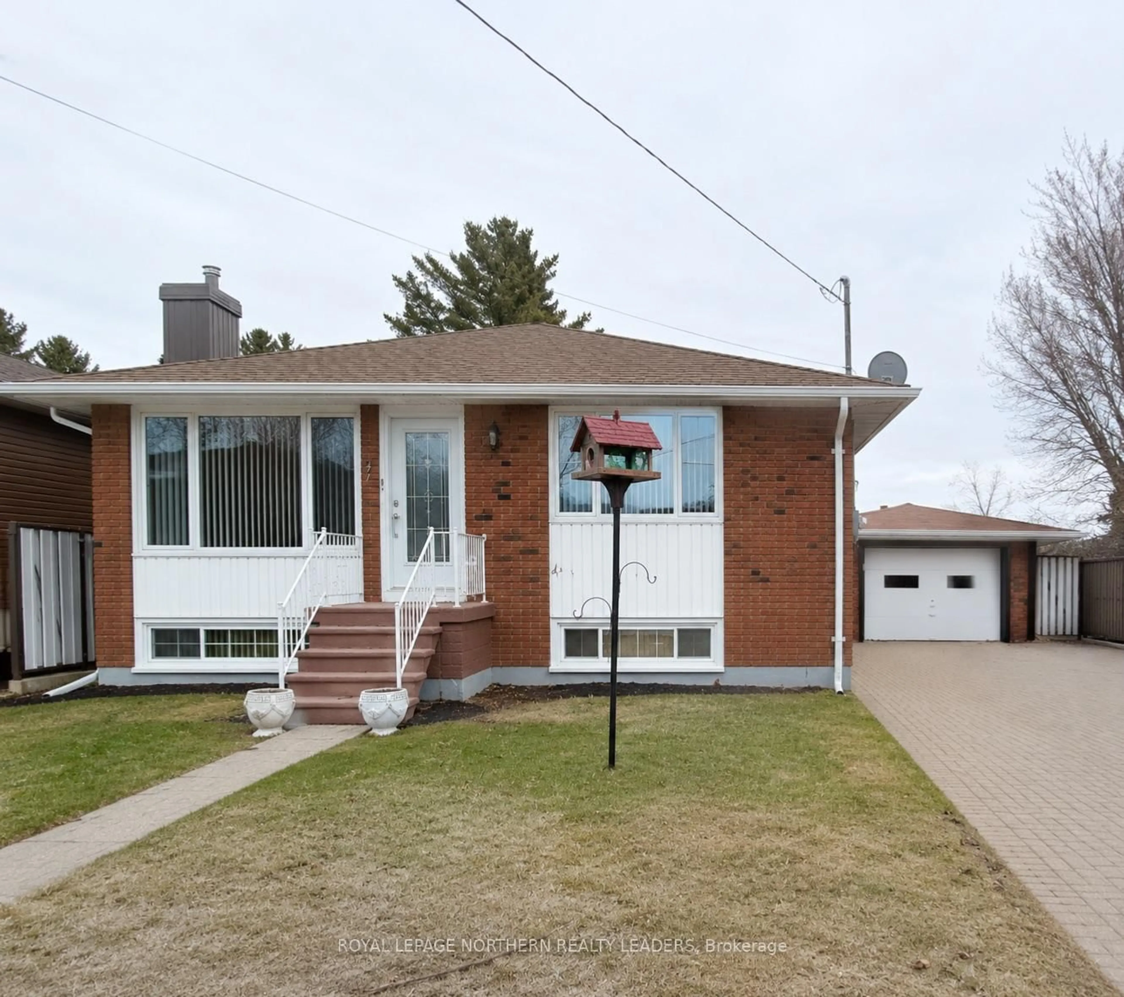 Home with brick exterior material, street for 57 Jubilee Ave, Timmins Ontario P4N 4M7