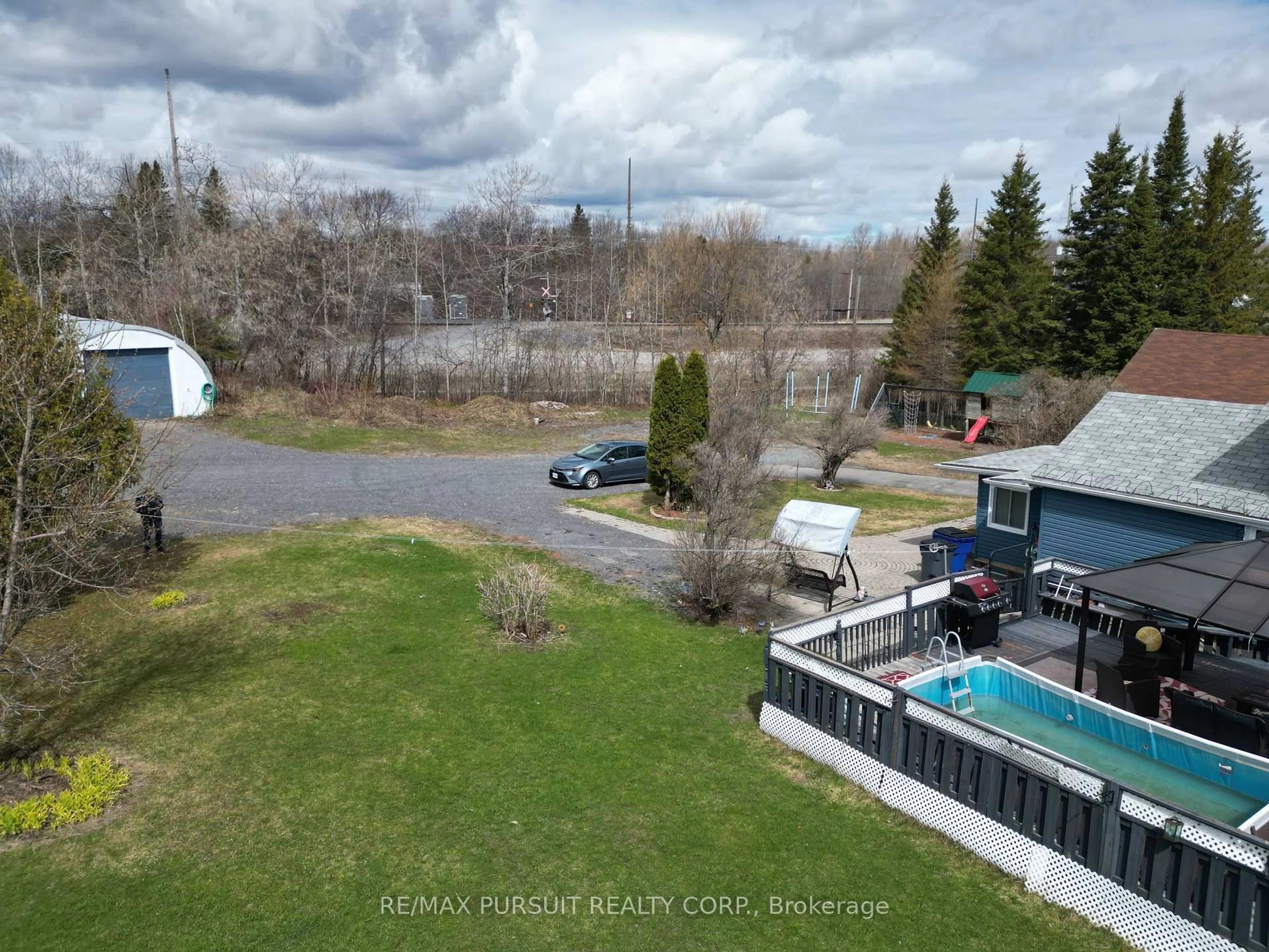 A pic from outside/outdoor area/front of a property/back of a property/a pic from drone, water/lake/river/ocean view for 183 Station St, Temiskaming Shores Ontario P0J 1R0