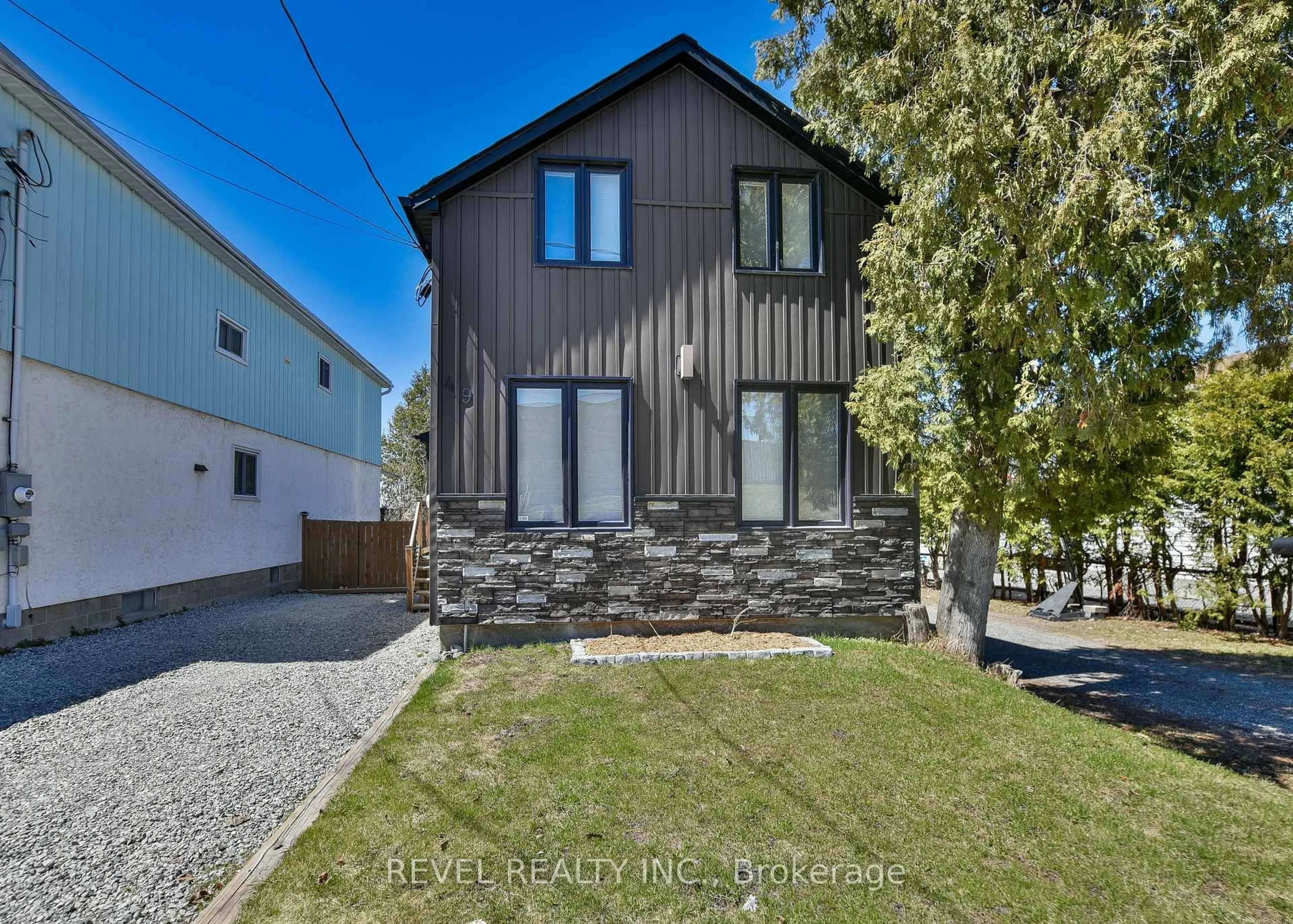 Home with brick exterior material, street for 49 Rea St, Timmins Ontario P4N 4Z5