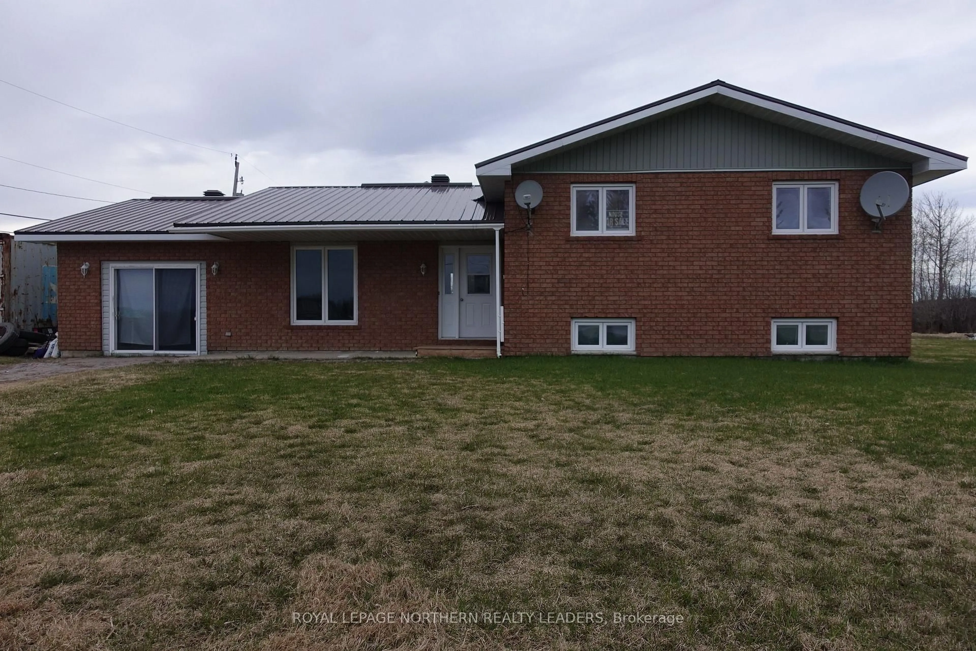 Home with brick exterior material, street for 4198 Hwy 101 Highway, Black River-Matheson Ontario P0K 1N0