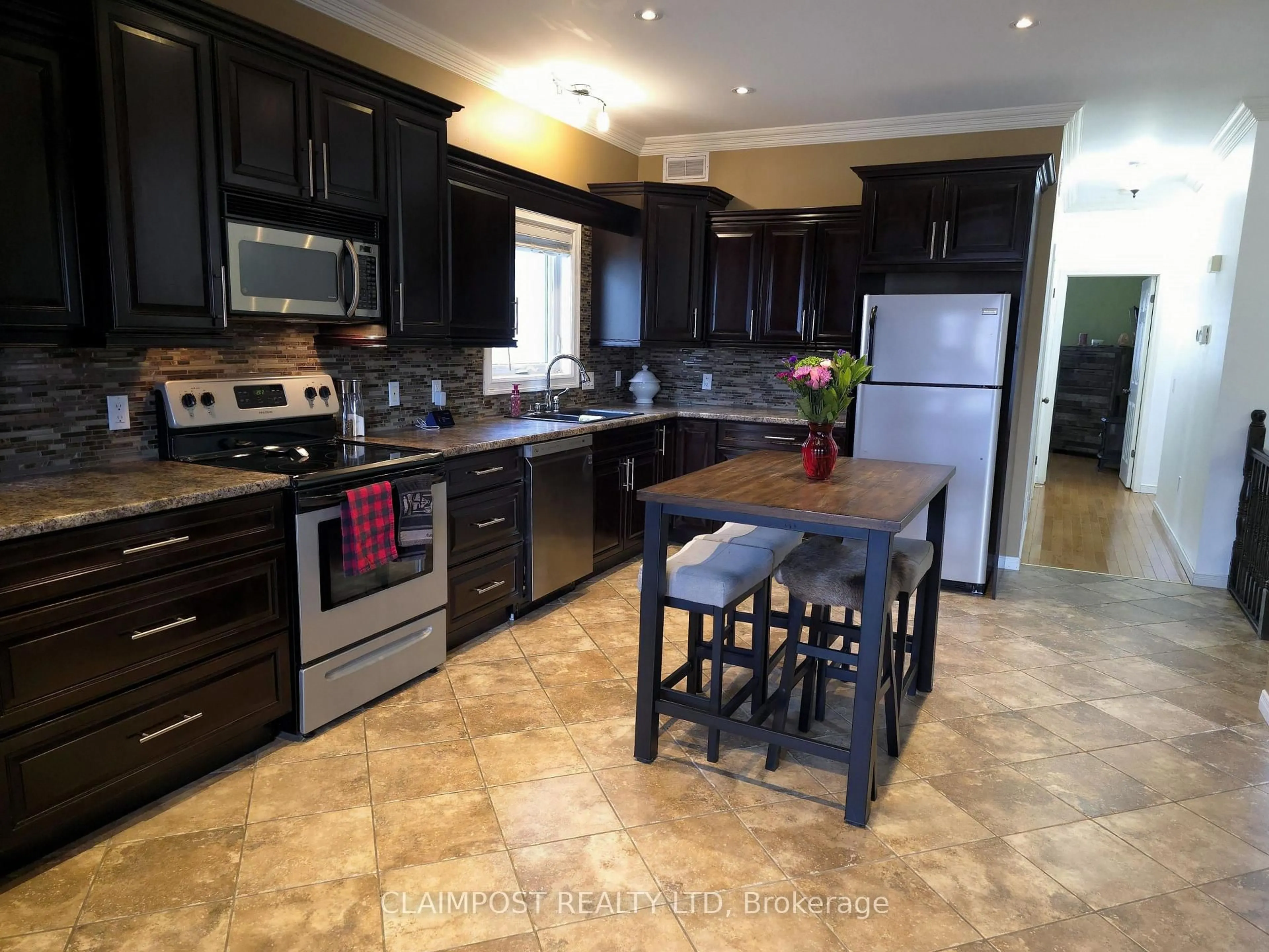 Open concept kitchen, ceramic/tile floor for 78 Majestic Dr, Timmins Ontario P4R 1N6