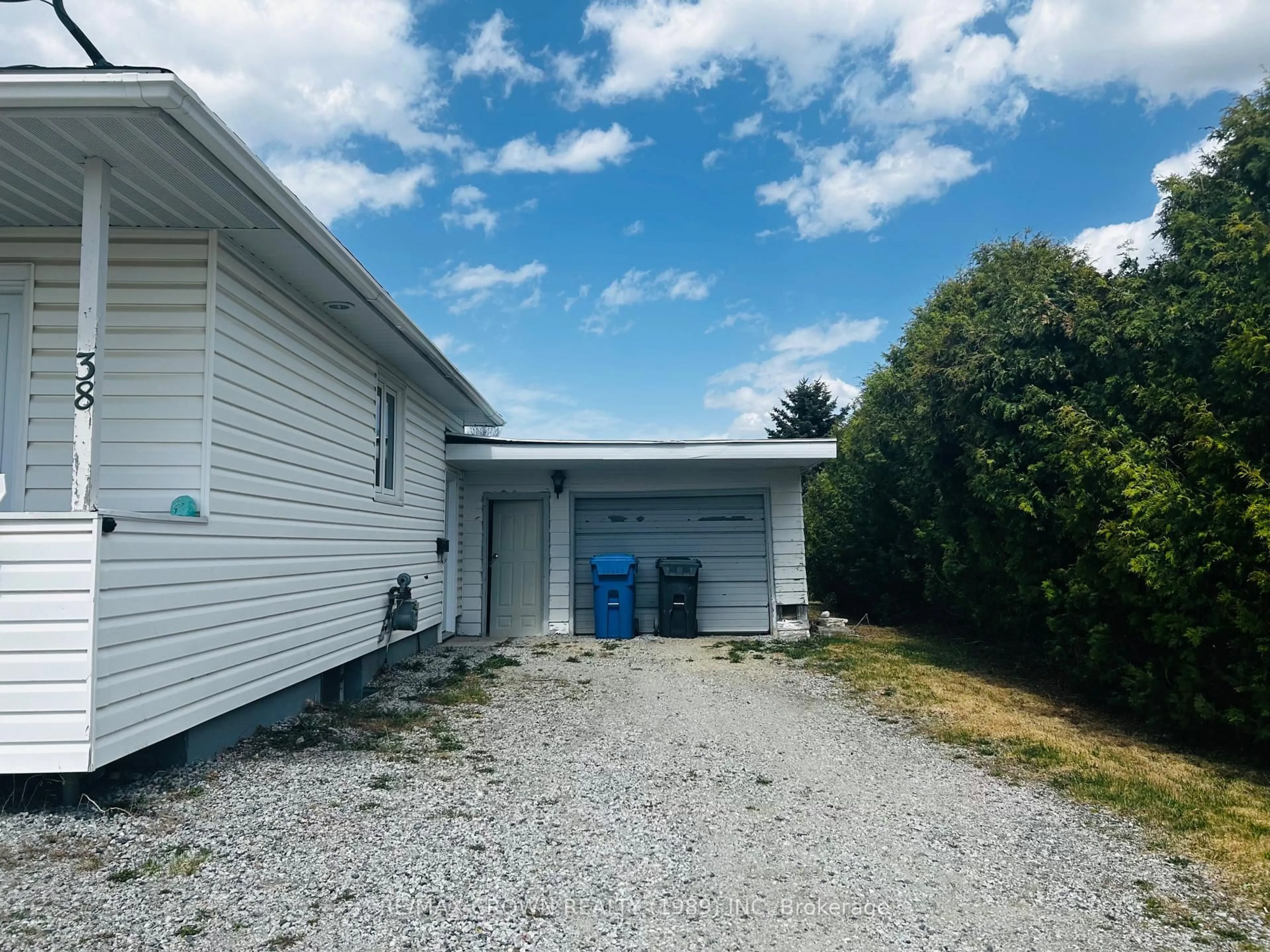 A pic from outside/outdoor area/front of a property/back of a property/a pic from drone, unknown for 38 Cournoyer St, Kapuskasing Ontario P5N 2N3