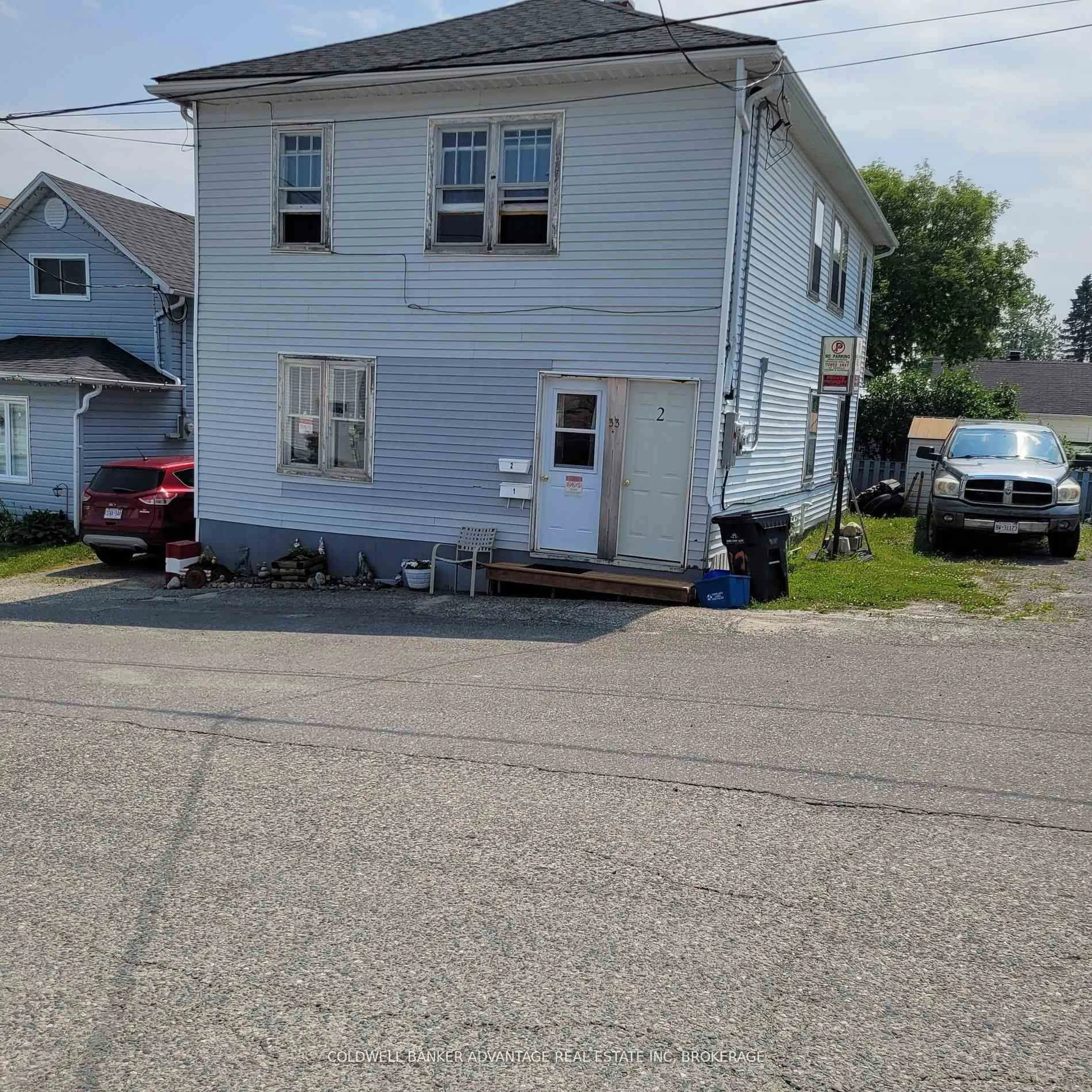 A pic from outside/outdoor area/front of a property/back of a property/a pic from drone, street for 33 Kirkpatrick St, Kirkland Lake Ontario P2N 2H1
