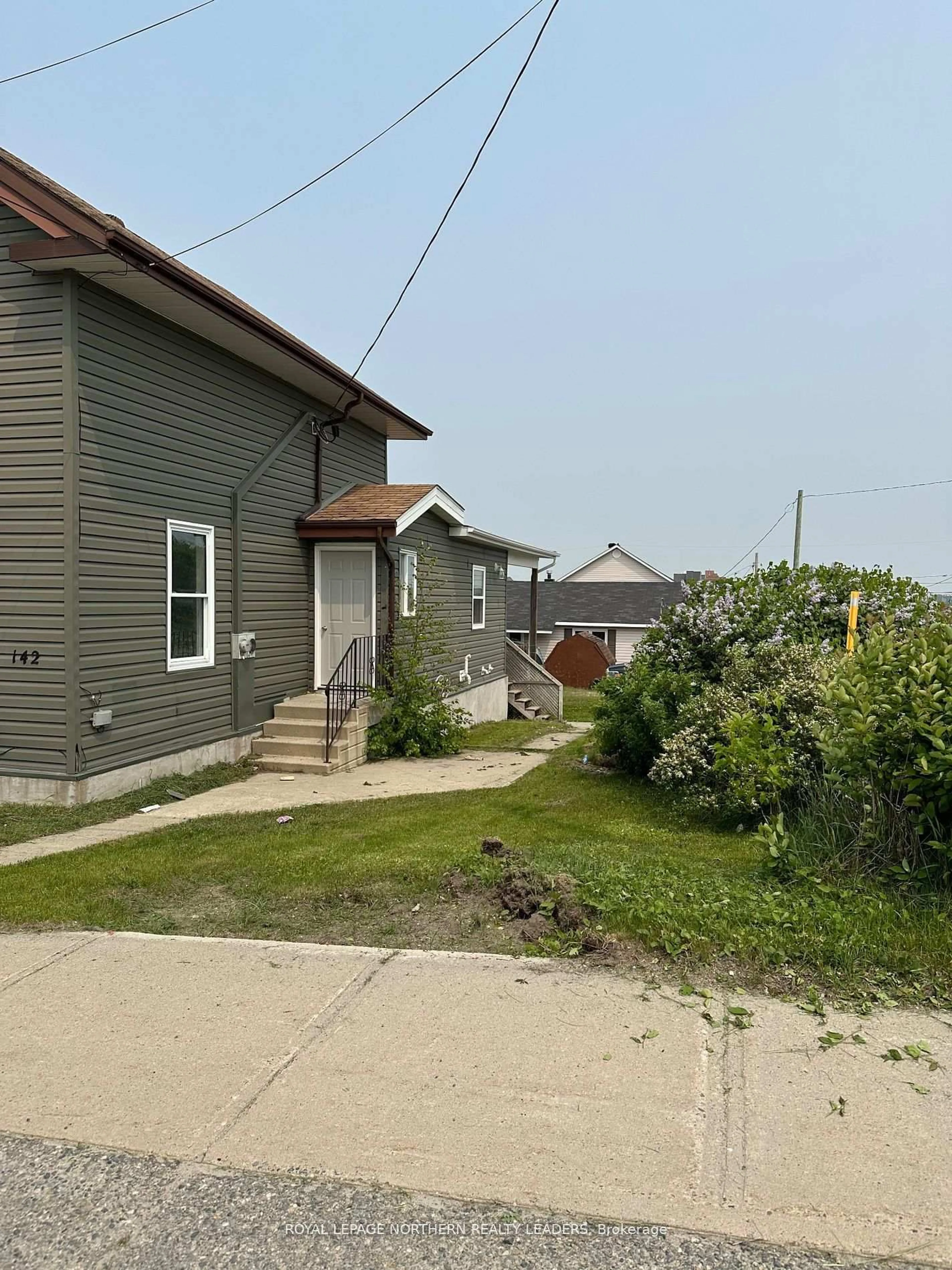 A pic from outside/outdoor area/front of a property/back of a property/a pic from drone, street for 142 Kent Ave, Timmins Ontario P4N 3C1