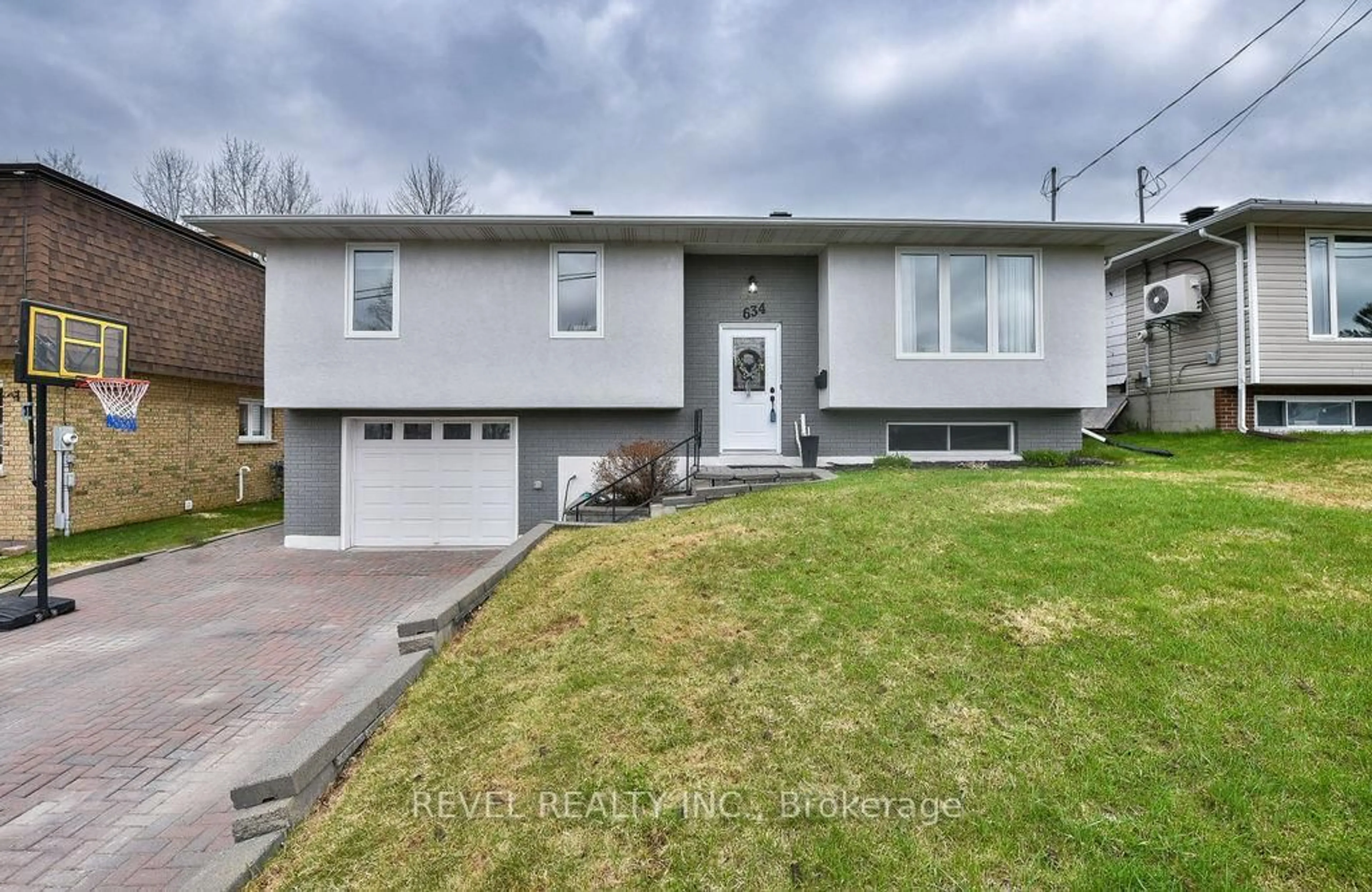Home with vinyl exterior material, street for 634 Tamarack St, Timmins Ontario P4N 7W3
