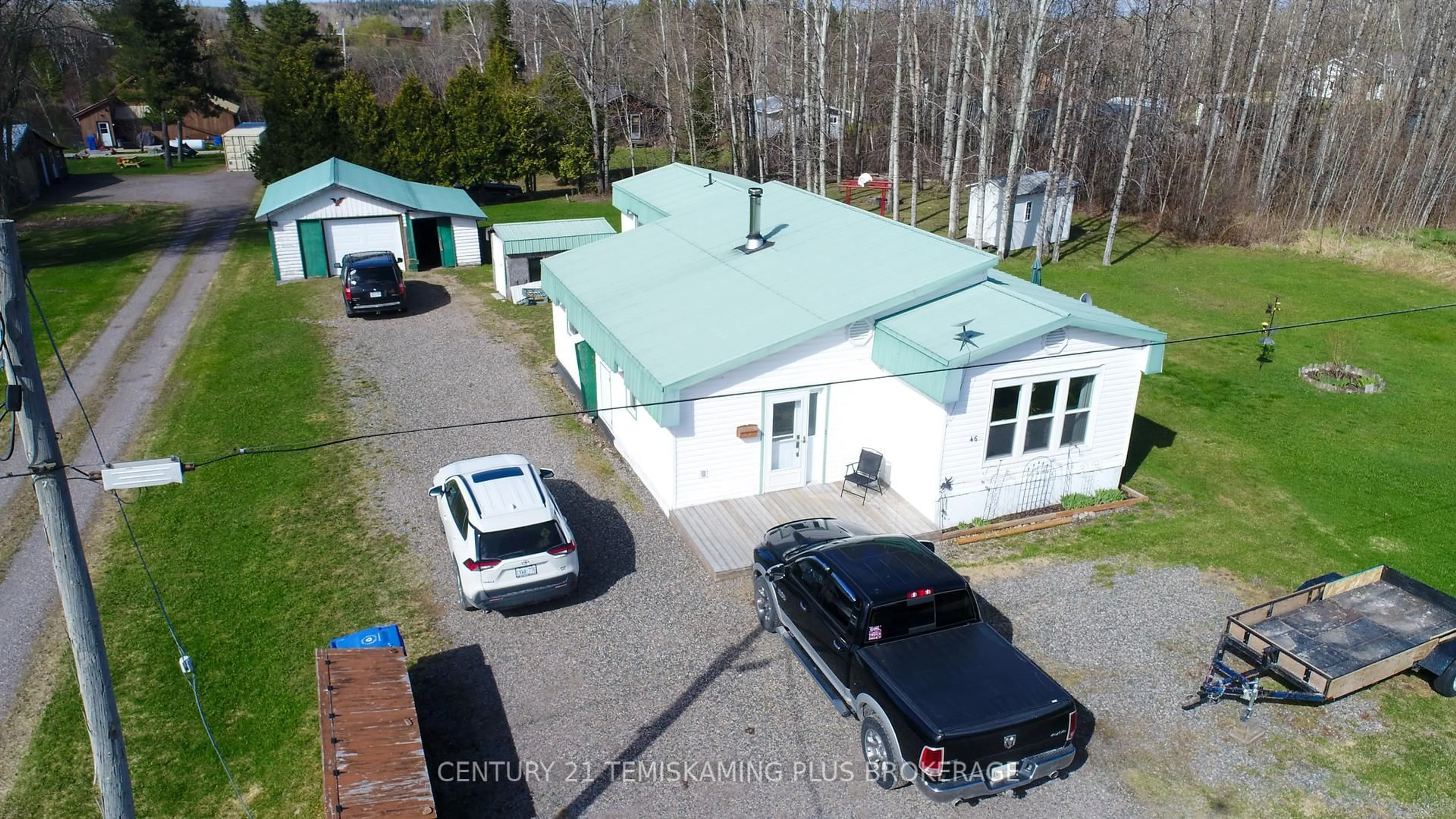 A pic from outside/outdoor area/front of a property/back of a property/a pic from drone, unknown for 46 Fifth St, Timiskaming Ontario P0J 1G0