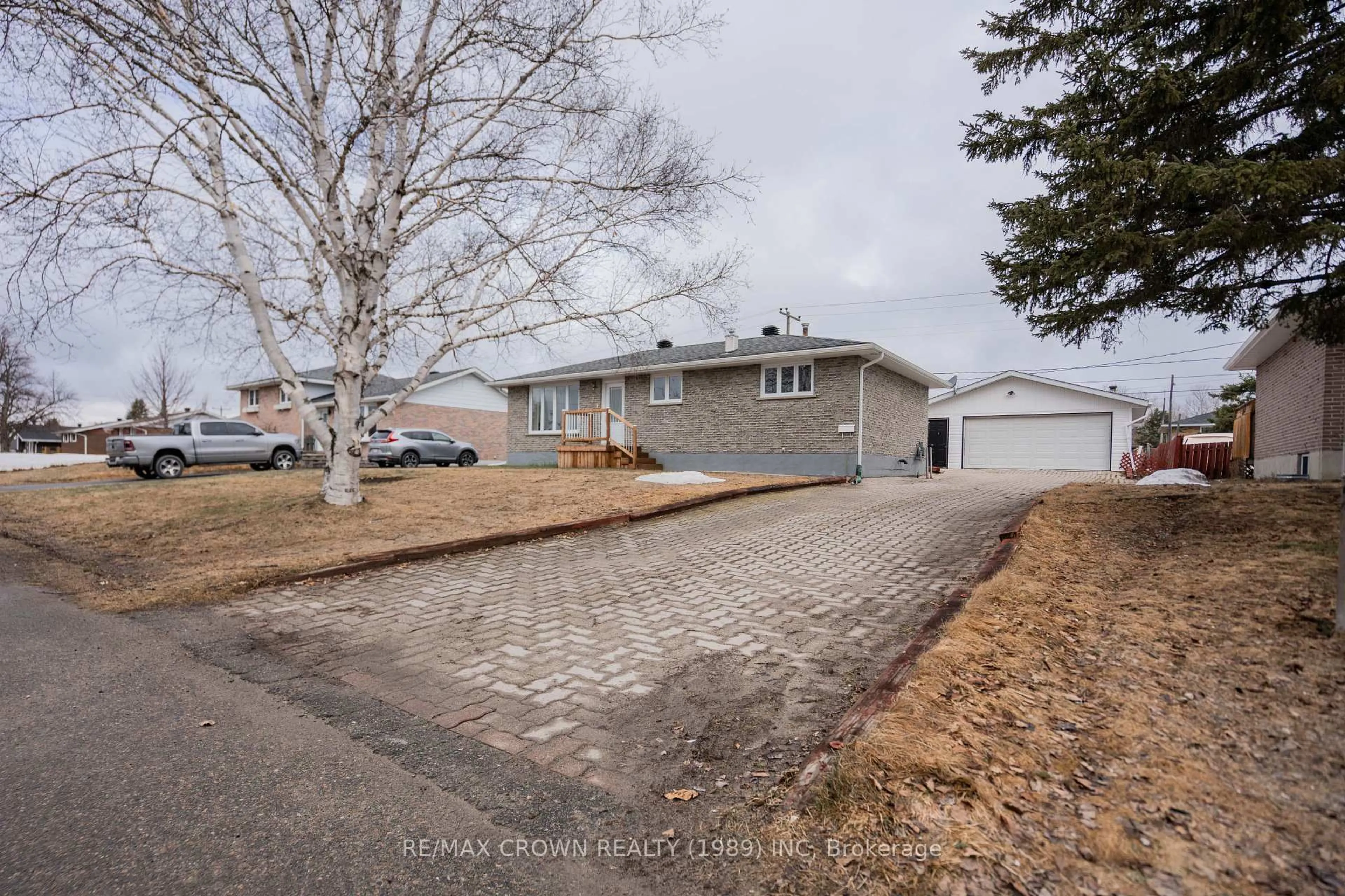 A pic from outside/outdoor area/front of a property/back of a property/a pic from drone, street for 21 Clark St, Kapuskasing Ontario P5N 1L3