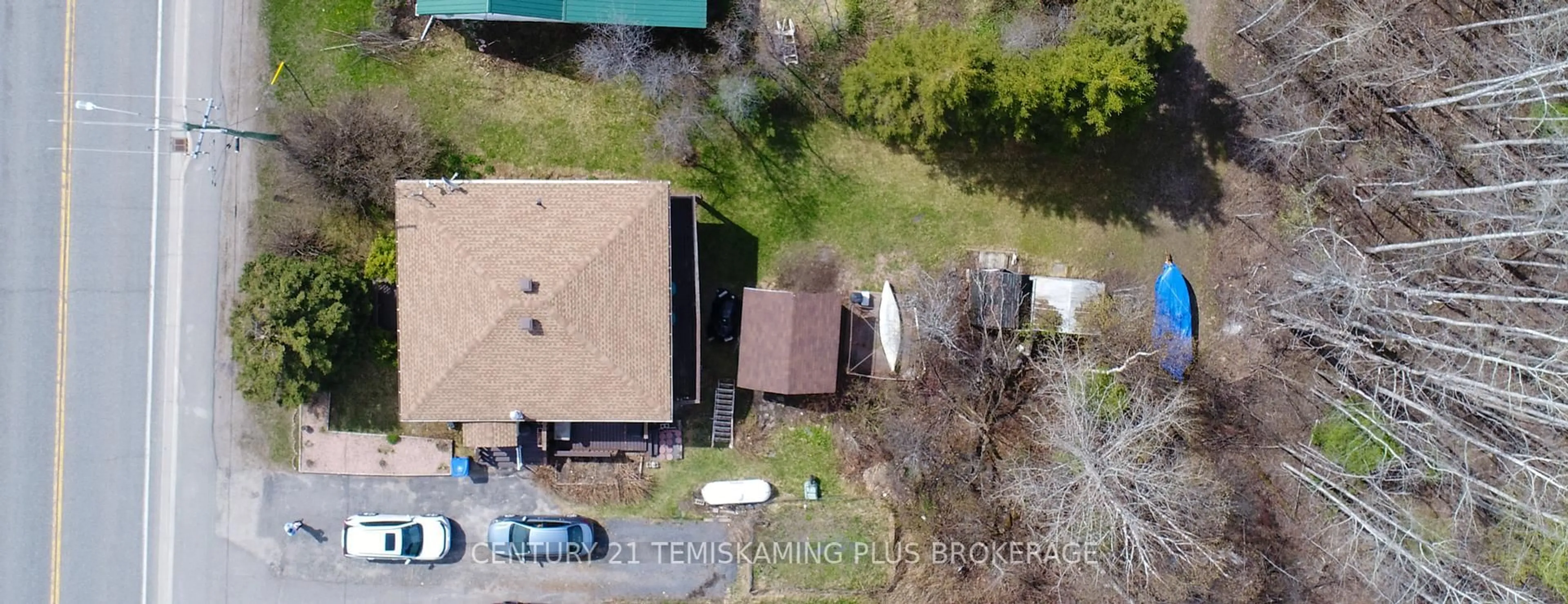 A pic from outside/outdoor area/front of a property/back of a property/a pic from drone, street for 69 Main St, Timiskaming Ontario P0J 1N0