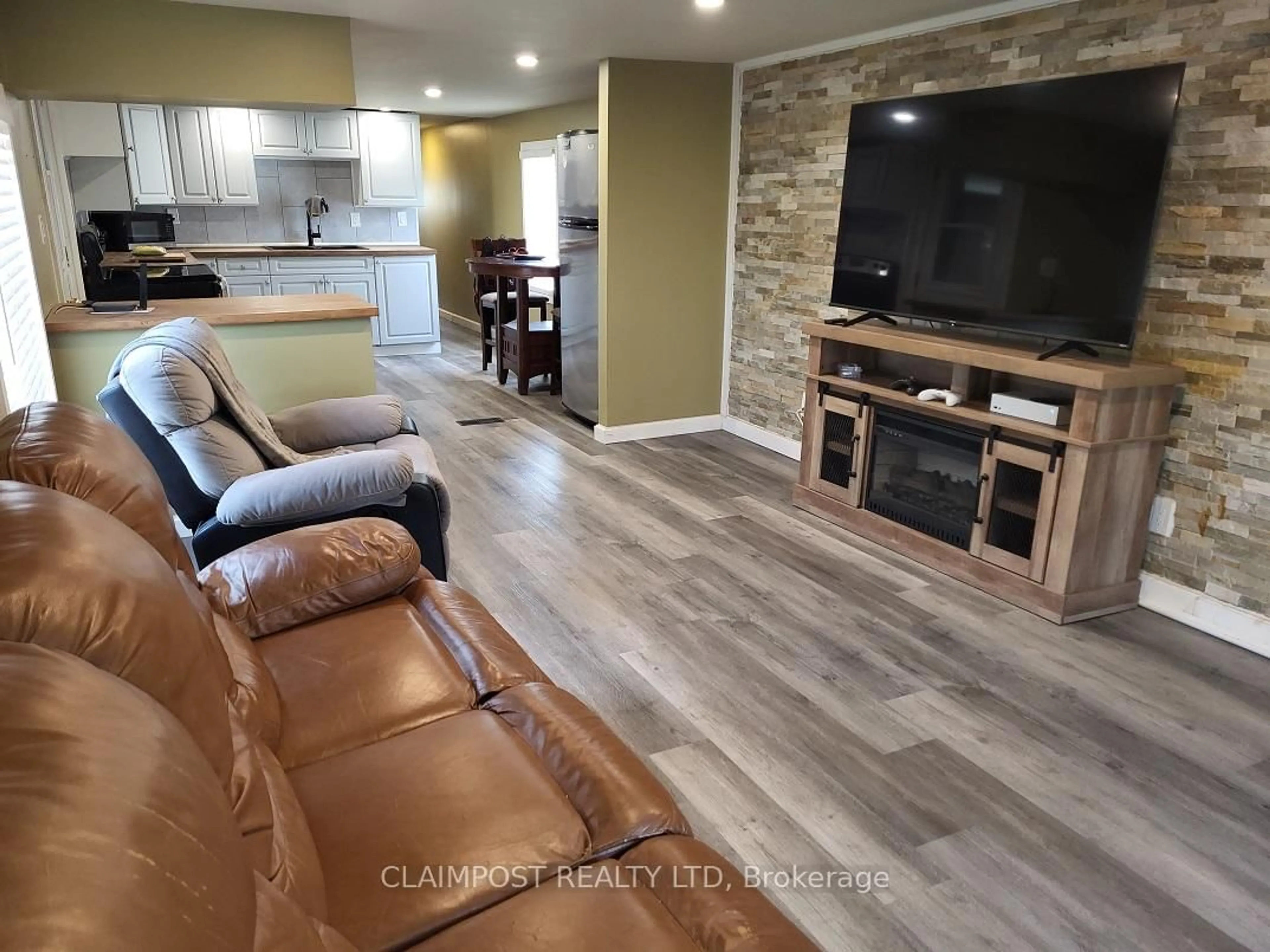 Living room with furniture, unknown for 2 Notre Dame Pl, Timmins Ontario P4R 0C9