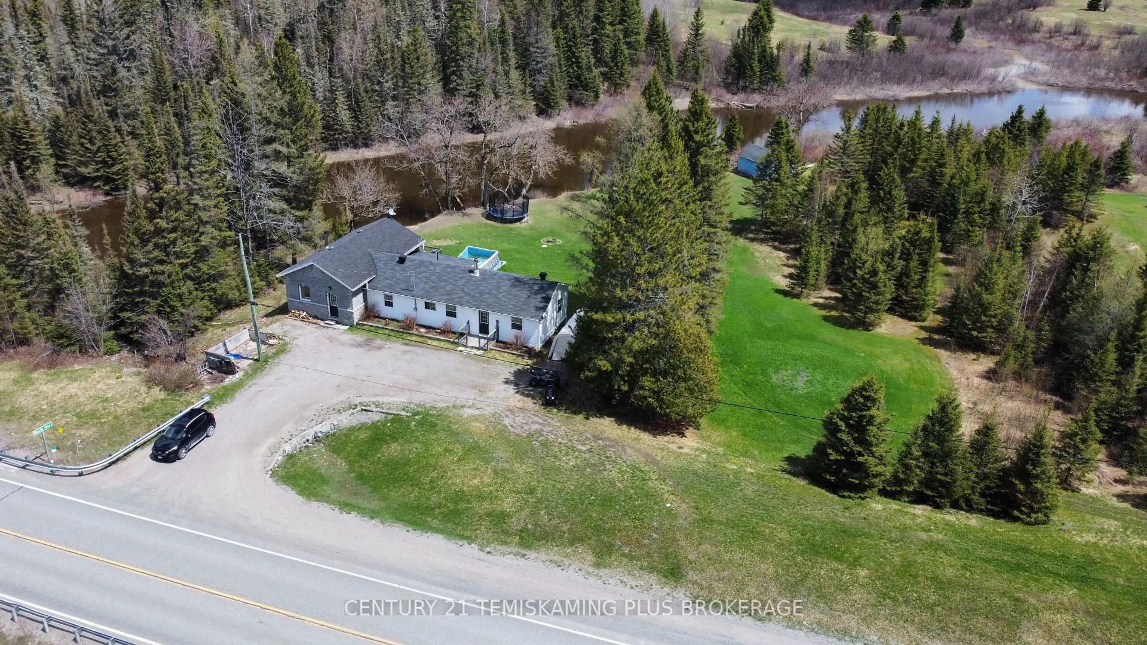 A pic from outside/outdoor area/front of a property/back of a property/a pic from drone, unknown for 5230 Highway 112, Kirkland Lake Ontario P0K 1V0
