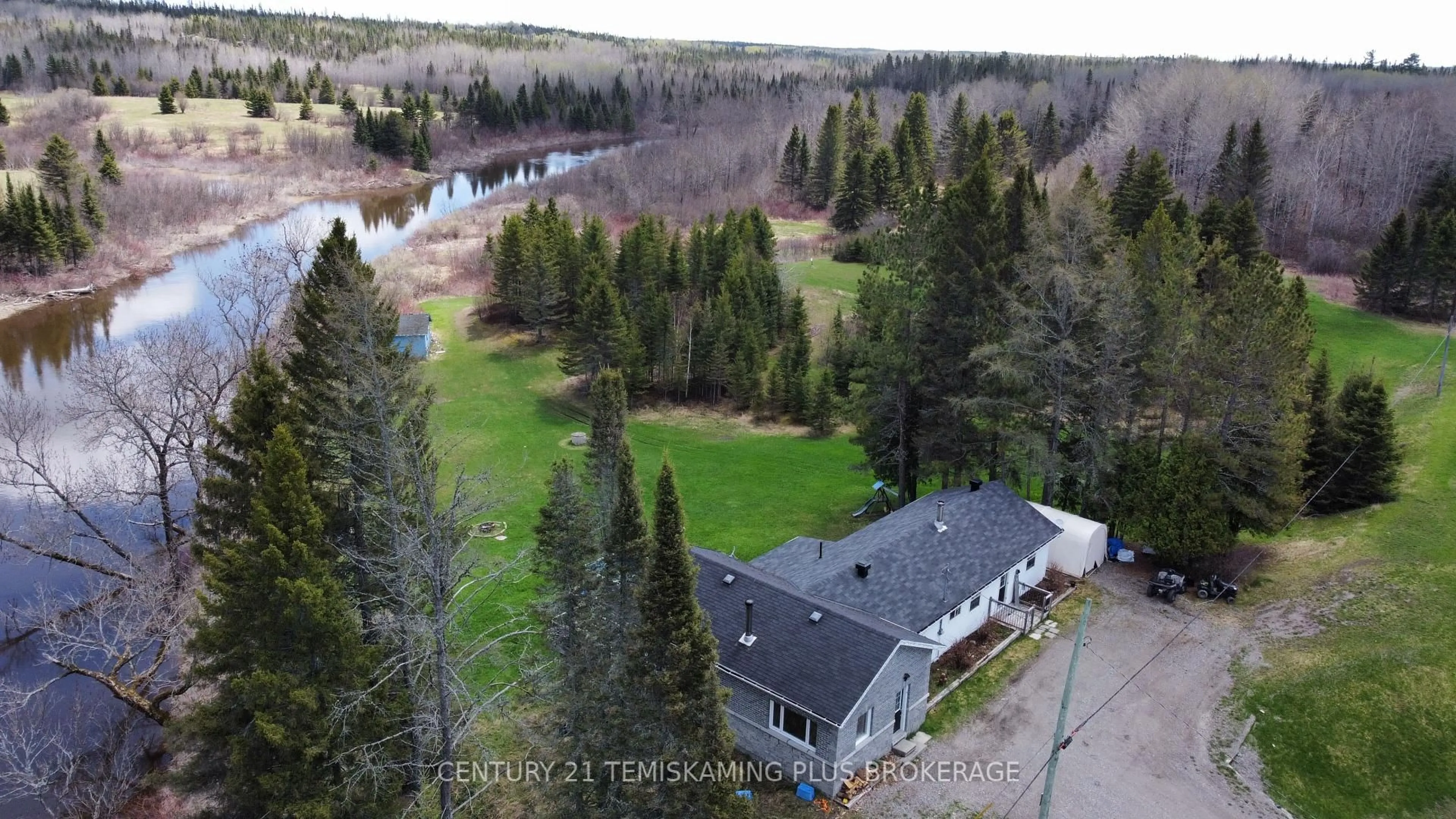 A pic from outside/outdoor area/front of a property/back of a property/a pic from drone, unknown for 5230 Highway 112, Kirkland Lake Ontario P0K 1V0