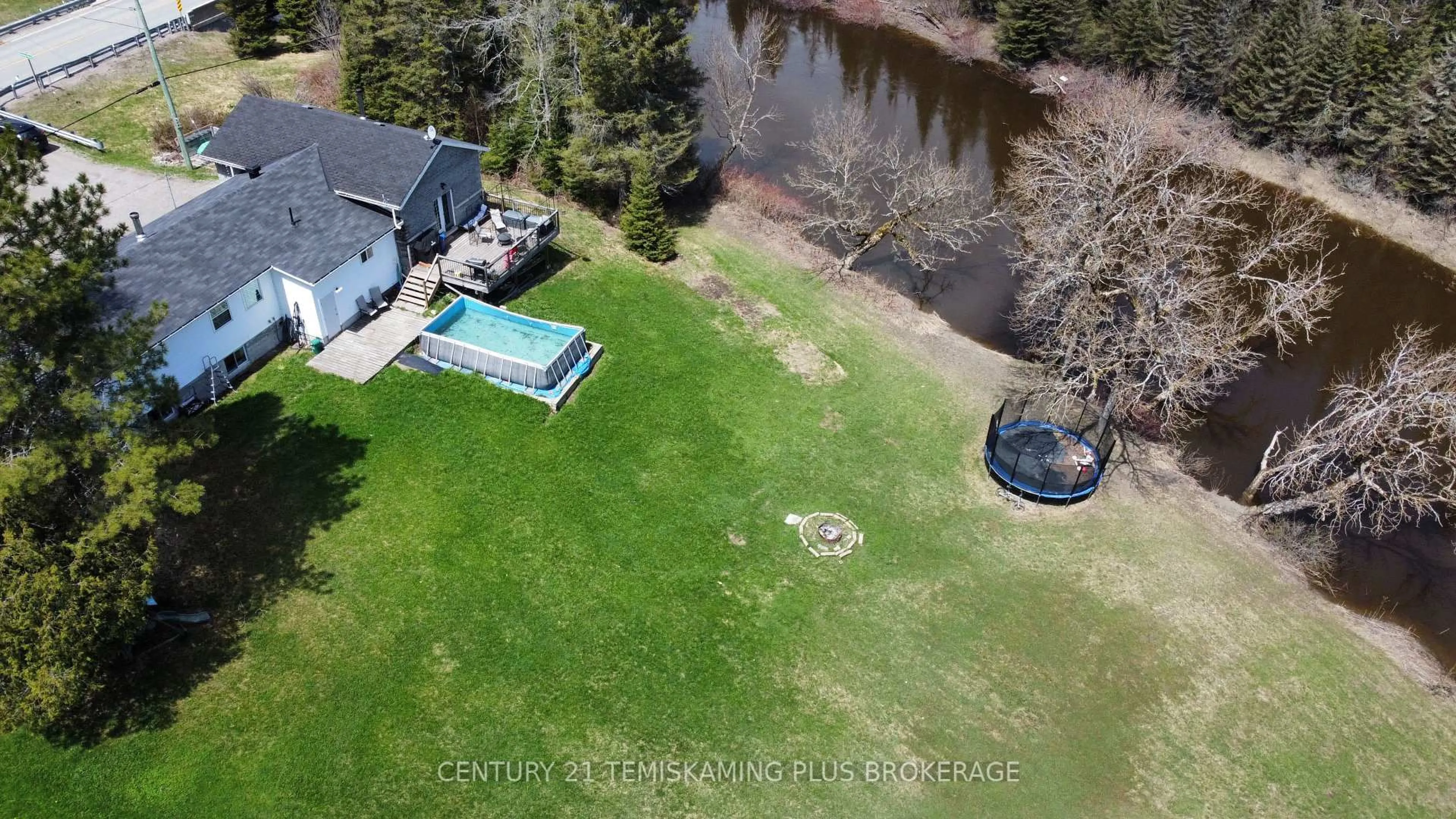A pic from outside/outdoor area/front of a property/back of a property/a pic from drone, water/lake/river/ocean view for 5230 Highway 112, Kirkland Lake Ontario P0K 1V0