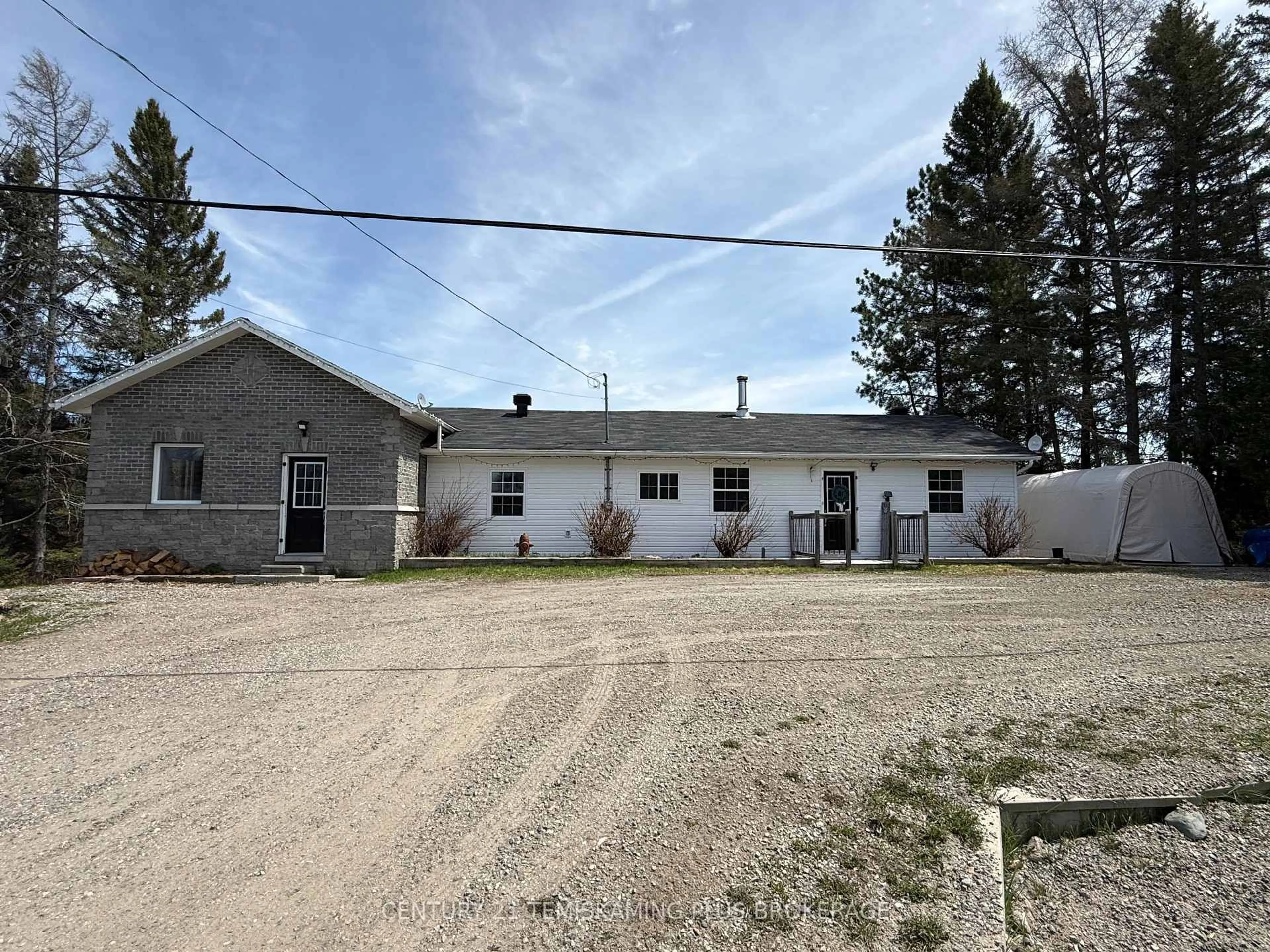 A pic from outside/outdoor area/front of a property/back of a property/a pic from drone, building for 5230 Highway 112, Kirkland Lake Ontario P0K 1V0