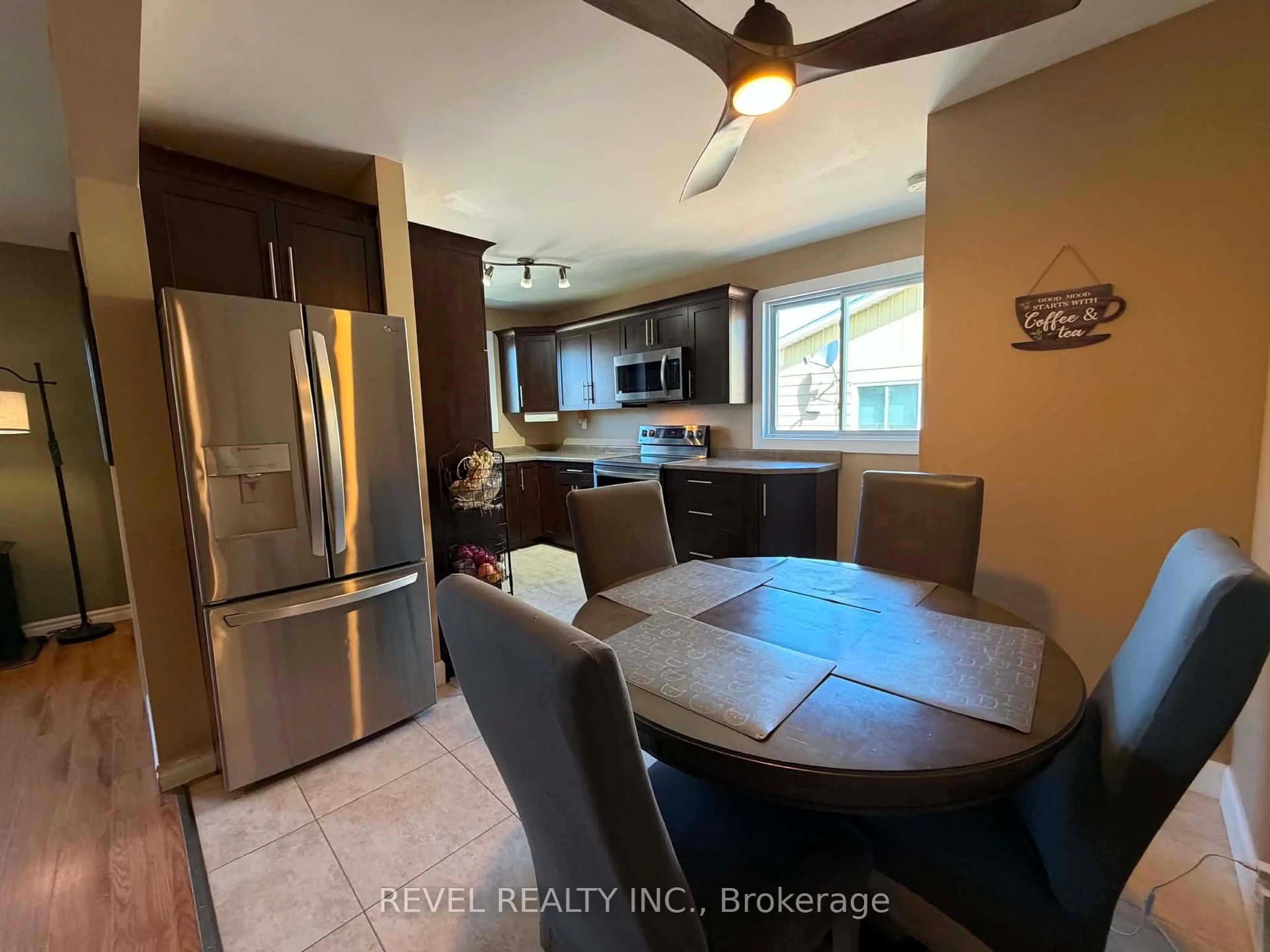 Open concept kitchen, ceramic/tile floor for 894 Suzanne St, Timmins Ontario P4P 1A9