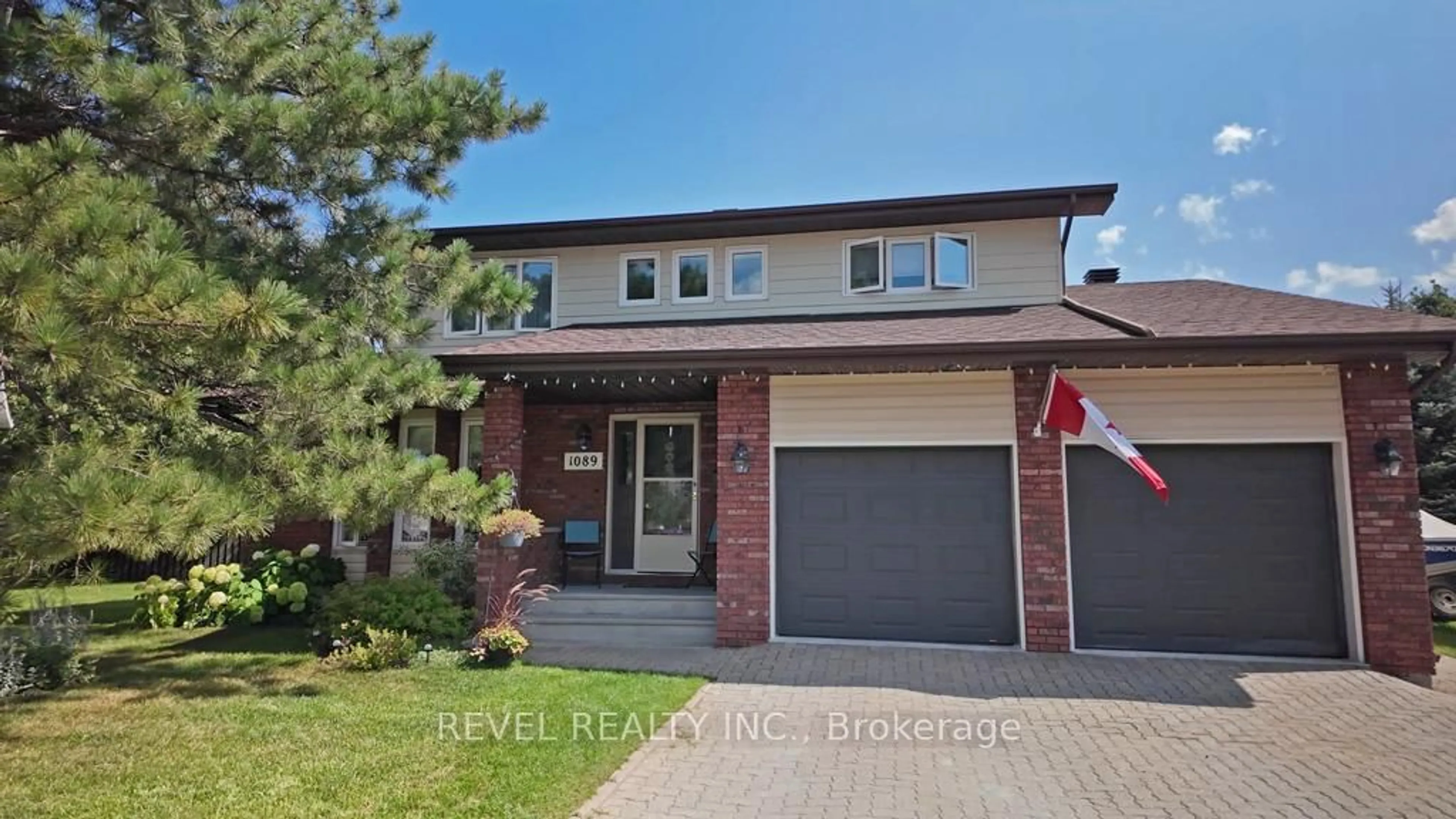 Home with brick exterior material, street for 1089 Greeningdon Dr, Timmins Ontario P4R 1G3