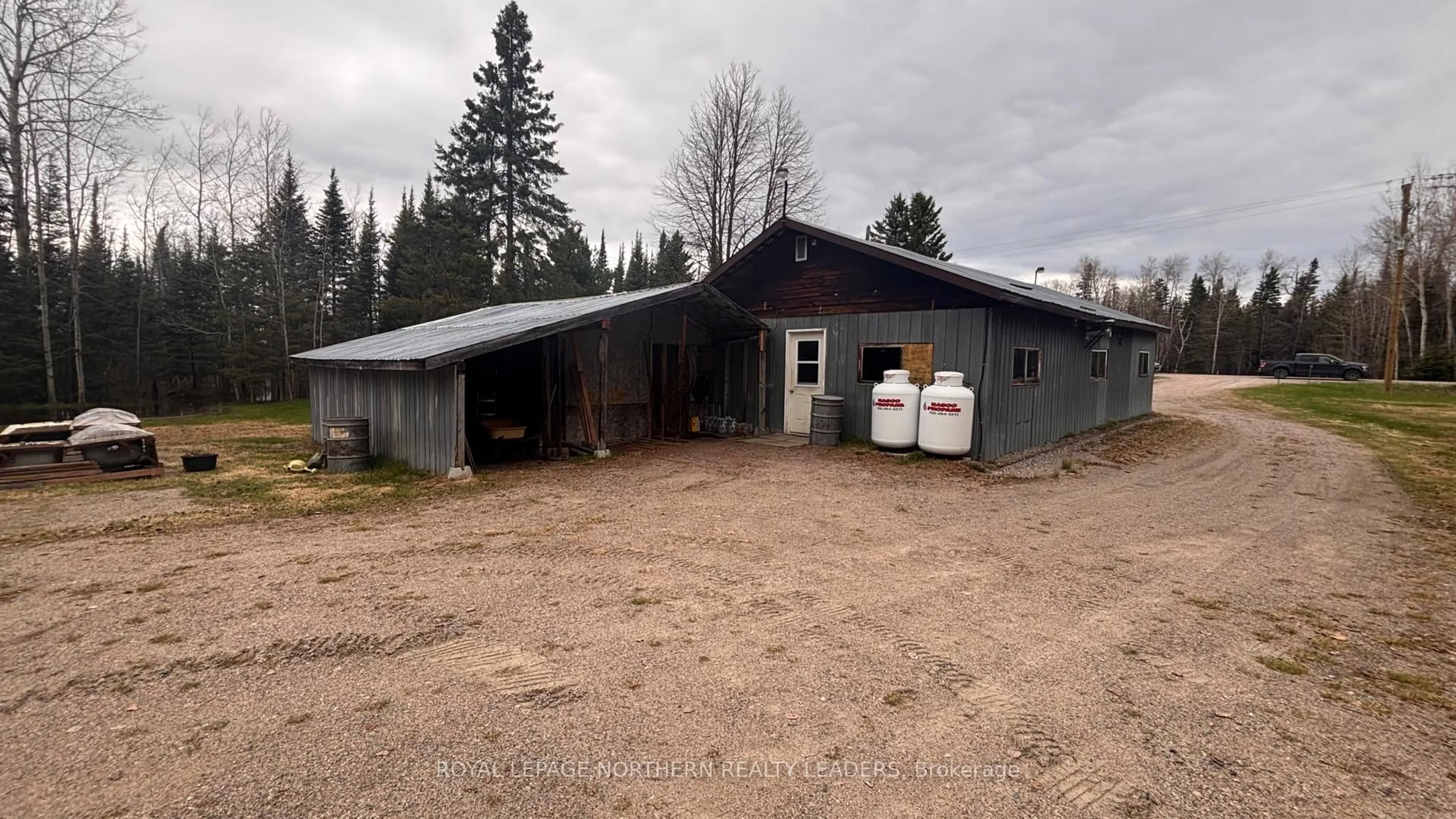A pic from outside/outdoor area/front of a property/back of a property/a pic from drone, building for 9255 Hwy 11 Highway, Iroquois Falls Ontario P0K 1G0