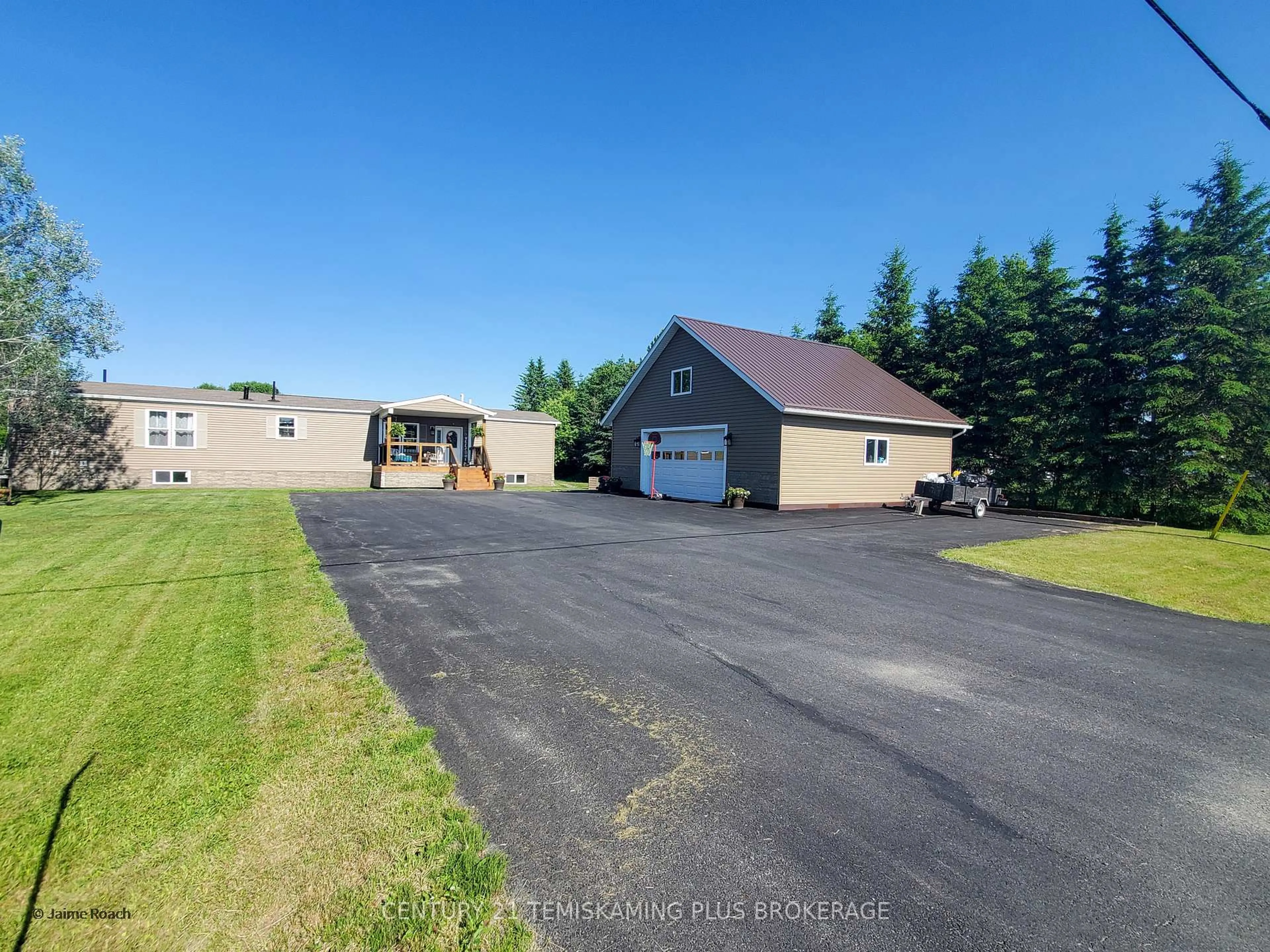 A pic from outside/outdoor area/front of a property/back of a property/a pic from drone, unknown for 474203 Kap Kig Iwan Rd, Englehart Ontario P0J 1H0