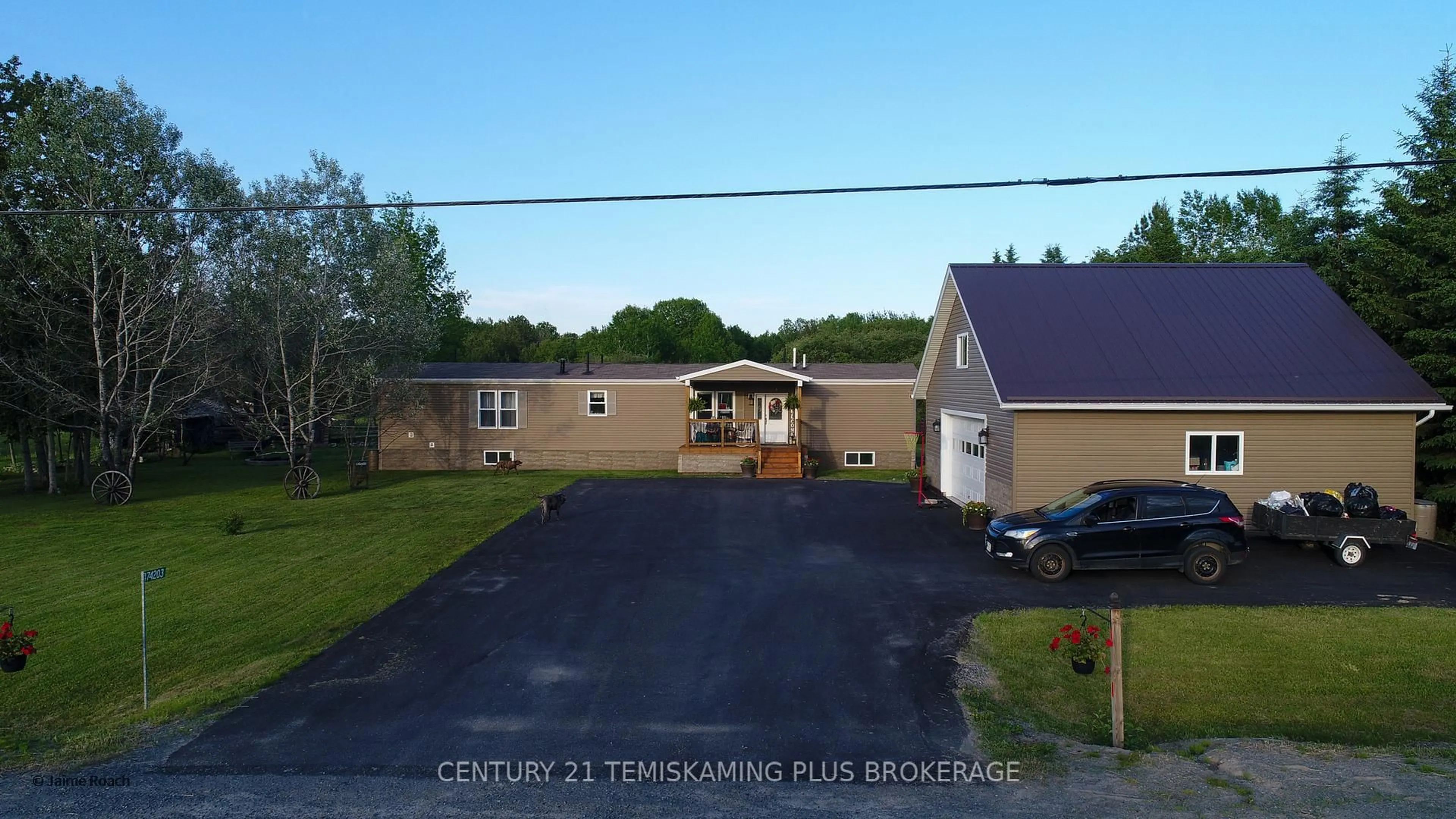 A pic from outside/outdoor area/front of a property/back of a property/a pic from drone, street for 474203 Kap Kig Iwan Rd, Englehart Ontario P0J 1H0