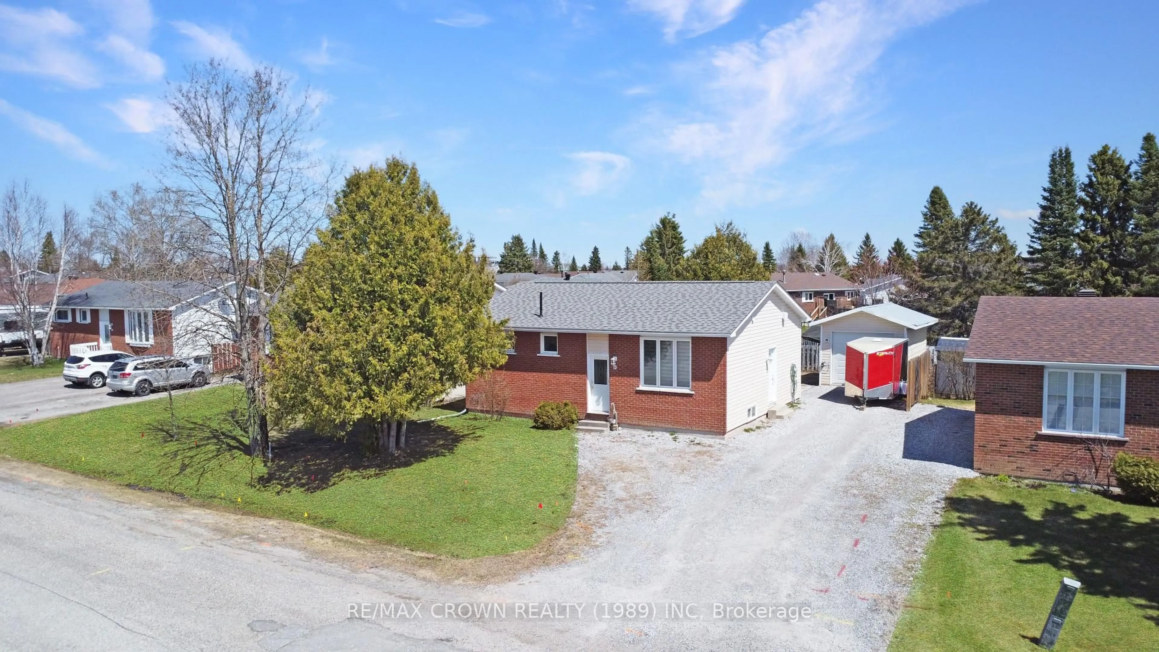 A pic from outside/outdoor area/front of a property/back of a property/a pic from drone, street for 73 McManus St, Hearst Ontario P0L 1N0