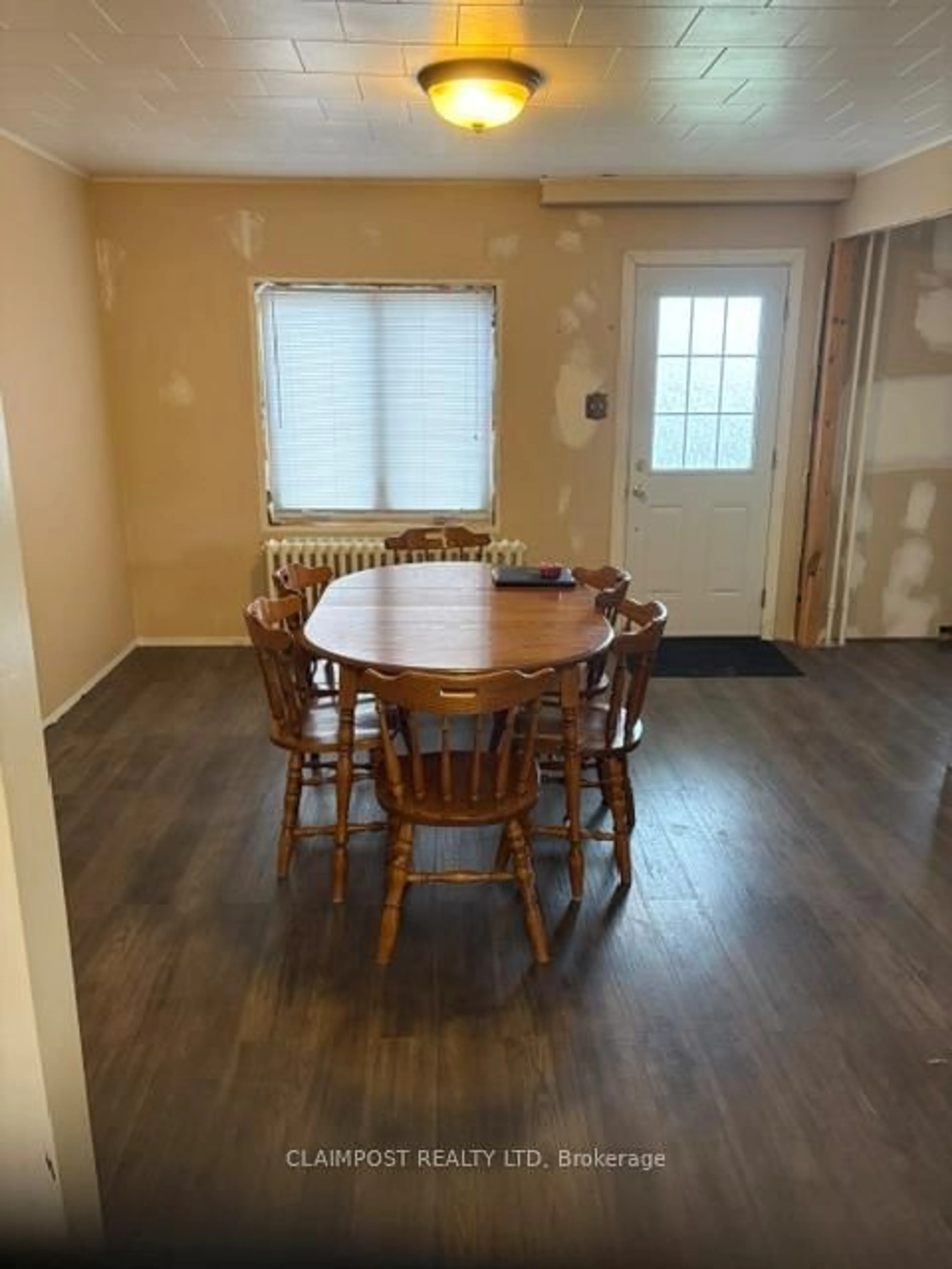 Dining room, wood/laminate floor for 59 Lincoln Ave, Timmins Ontario P4N 4K1