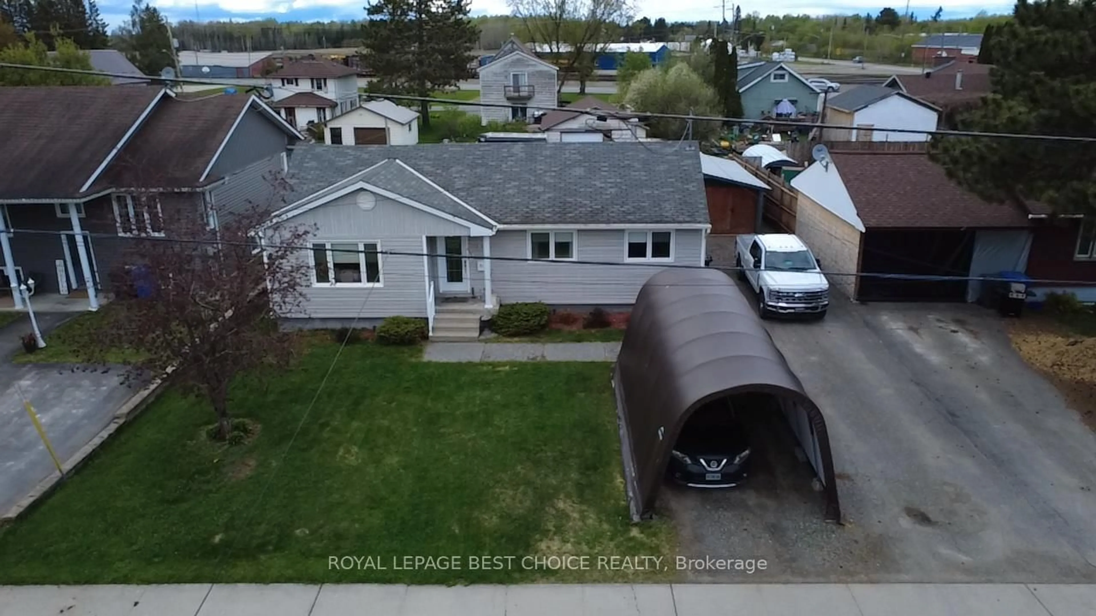 A pic from outside/outdoor area/front of a property/back of a property/a pic from drone, street for 27 6th Ave, Englehart Ontario P0J 1H0