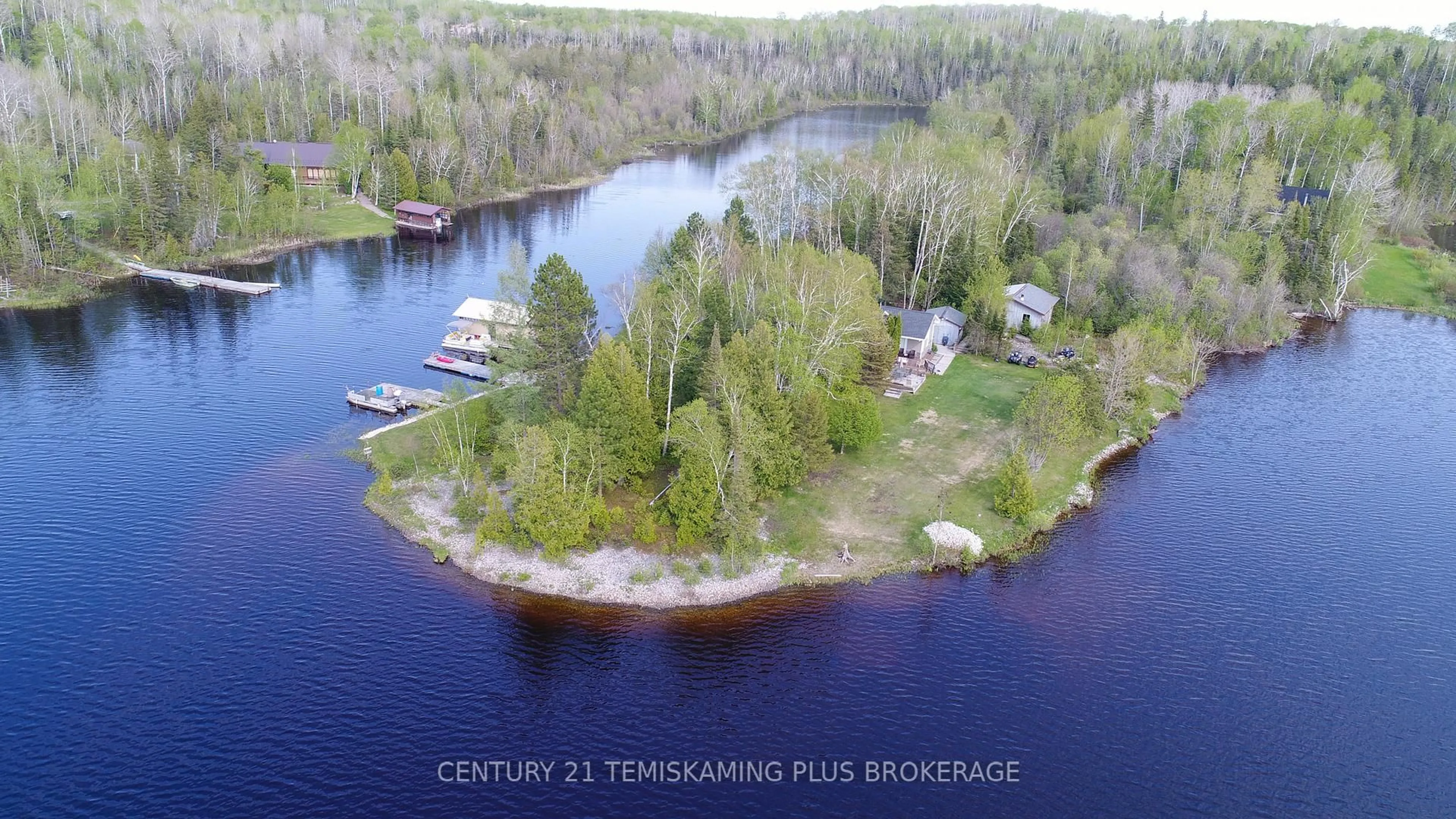 A pic from outside/outdoor area/front of a property/back of a property/a pic from drone, water/lake/river/ocean view for 794022 Island Rd, Englehart Ontario P0J 1B0