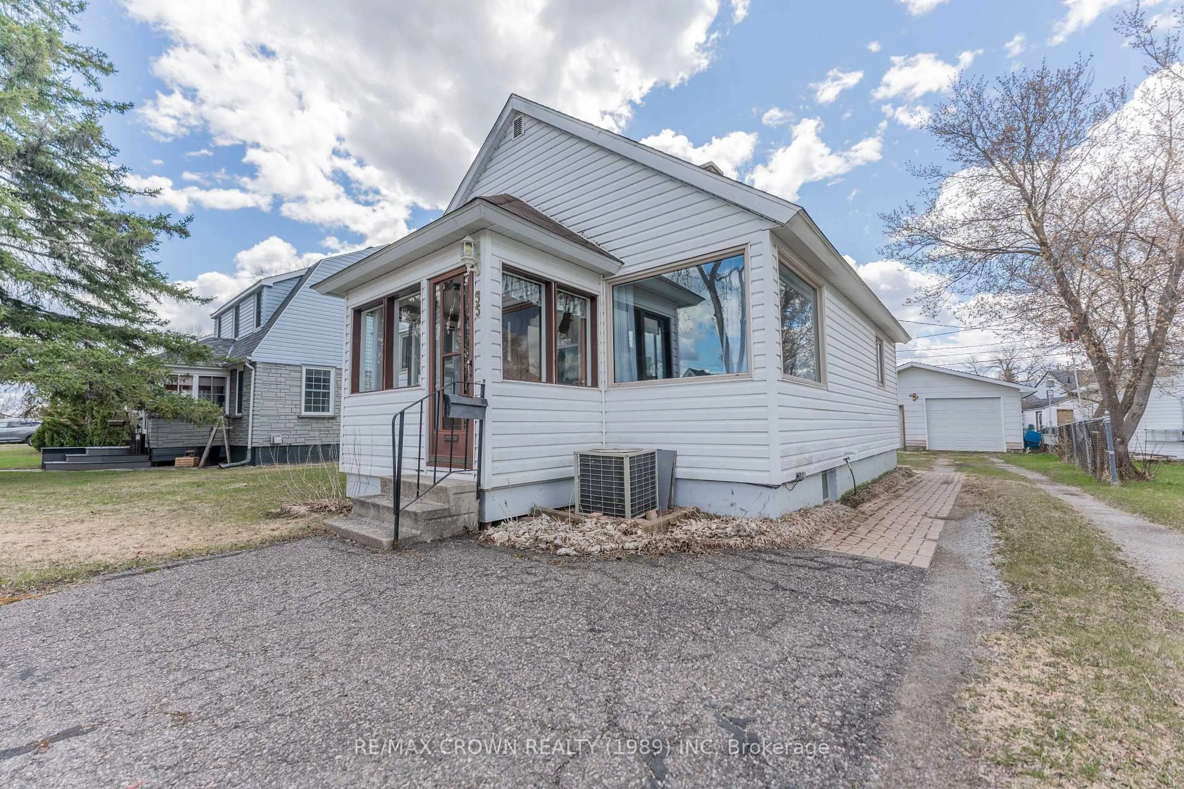 Home with vinyl exterior material, street for 35 Bowman Ave, Kapuskasing Ontario P5N 1M9