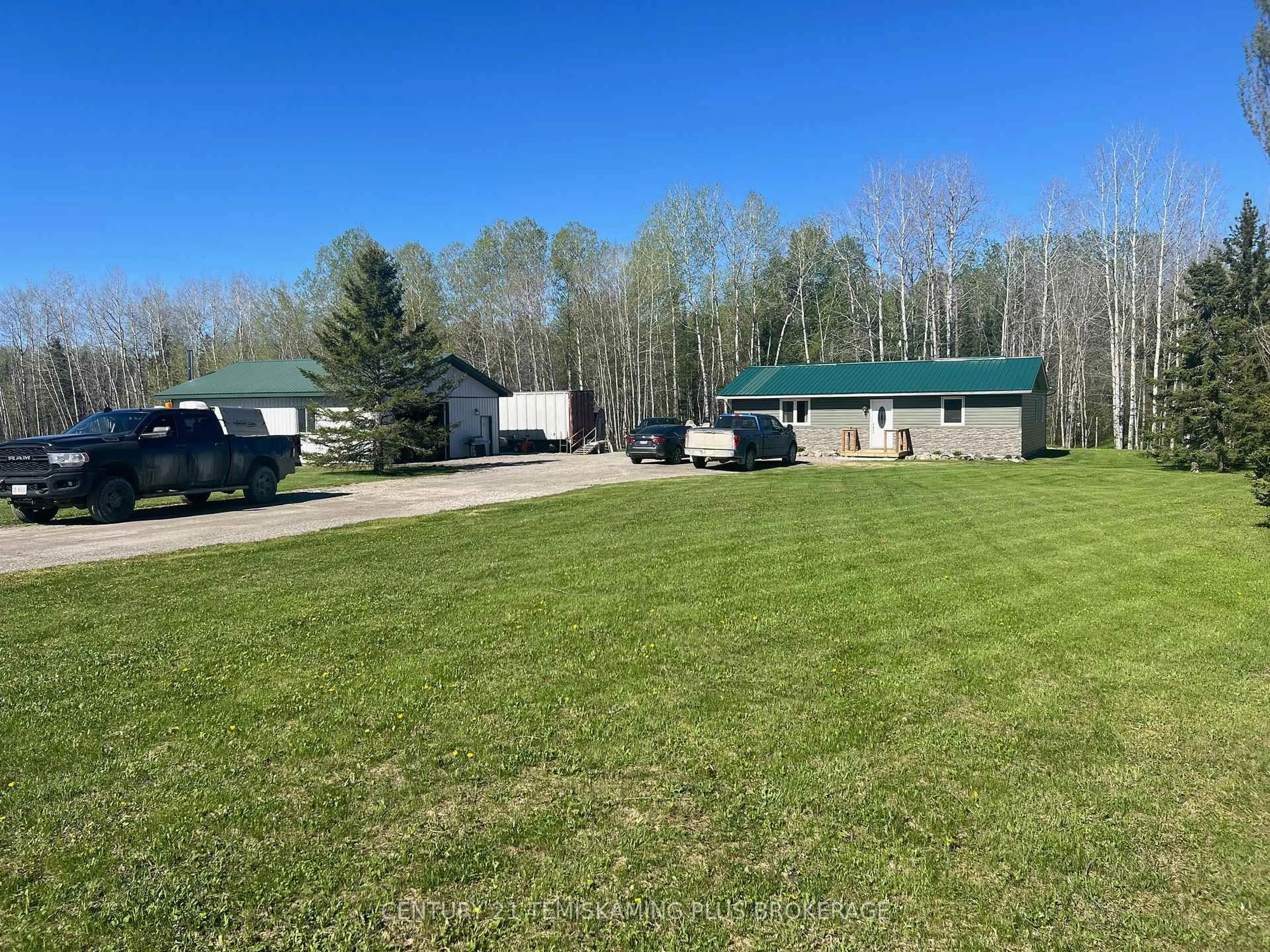 A pic from outside/outdoor area/front of a property/back of a property/a pic from drone, unknown for 533142 River Rd, Englehart Ontario P0J 1H0