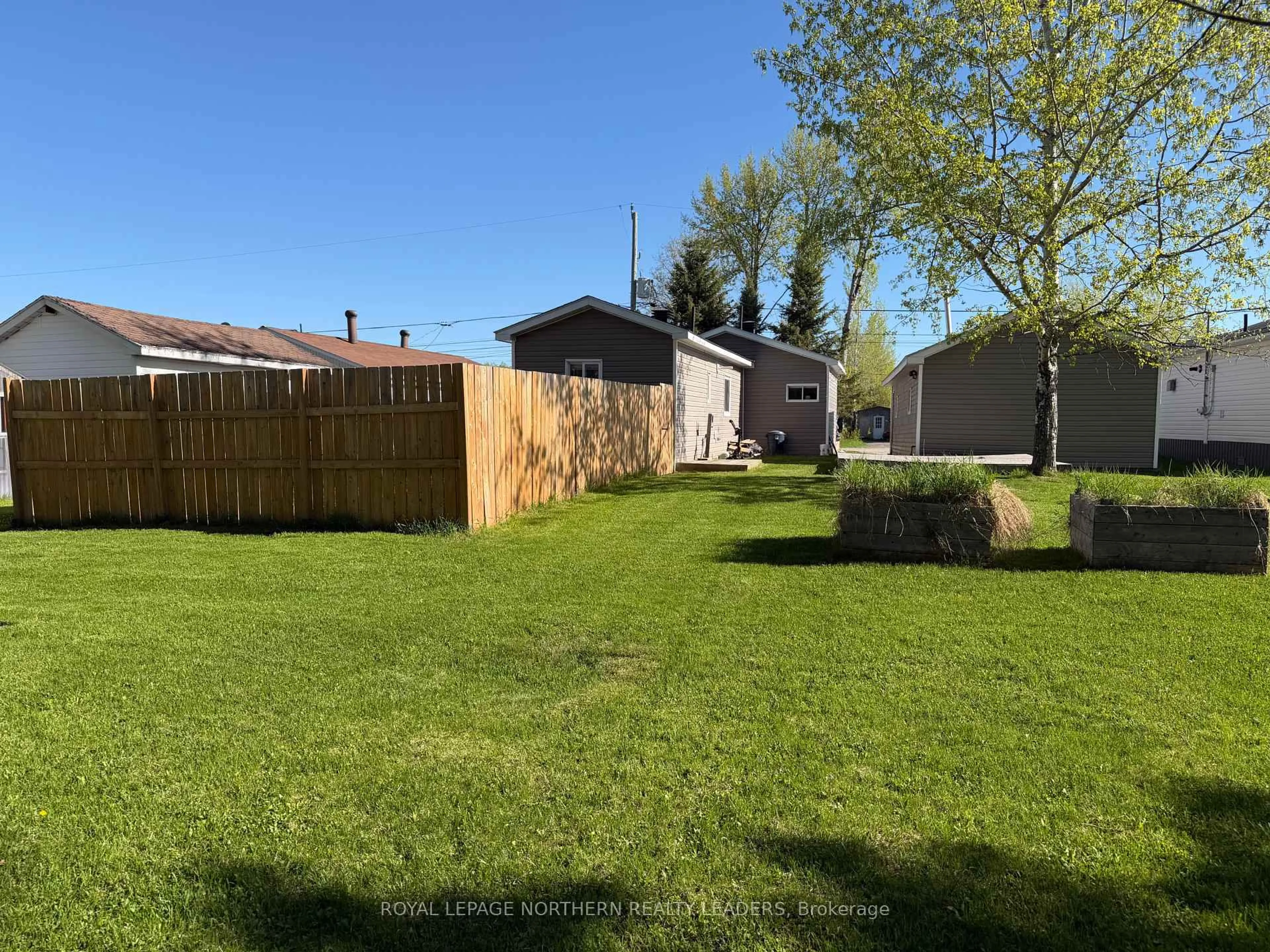 A pic from outside/outdoor area/front of a property/back of a property/a pic from drone, street for 22 Notre Dame St, Timmins Ontario P4R 0C9